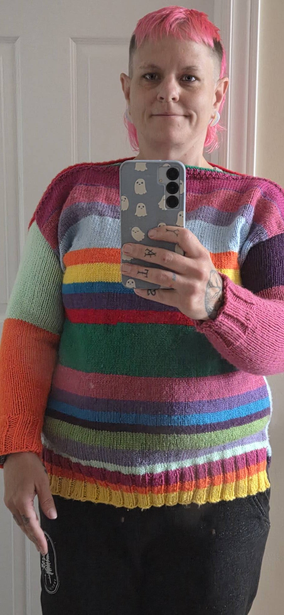 Chaos knitting sweater with random colors and improvised pattern