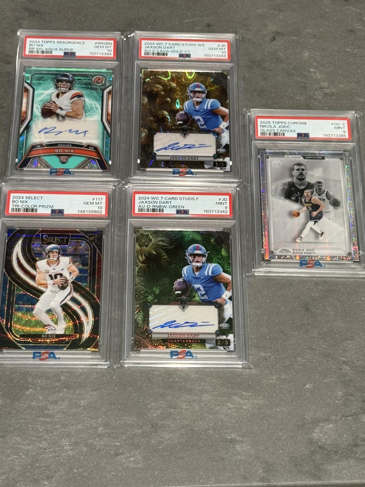 PSA graded sports cards featuring Jaxson Dart and Nikola Jokić