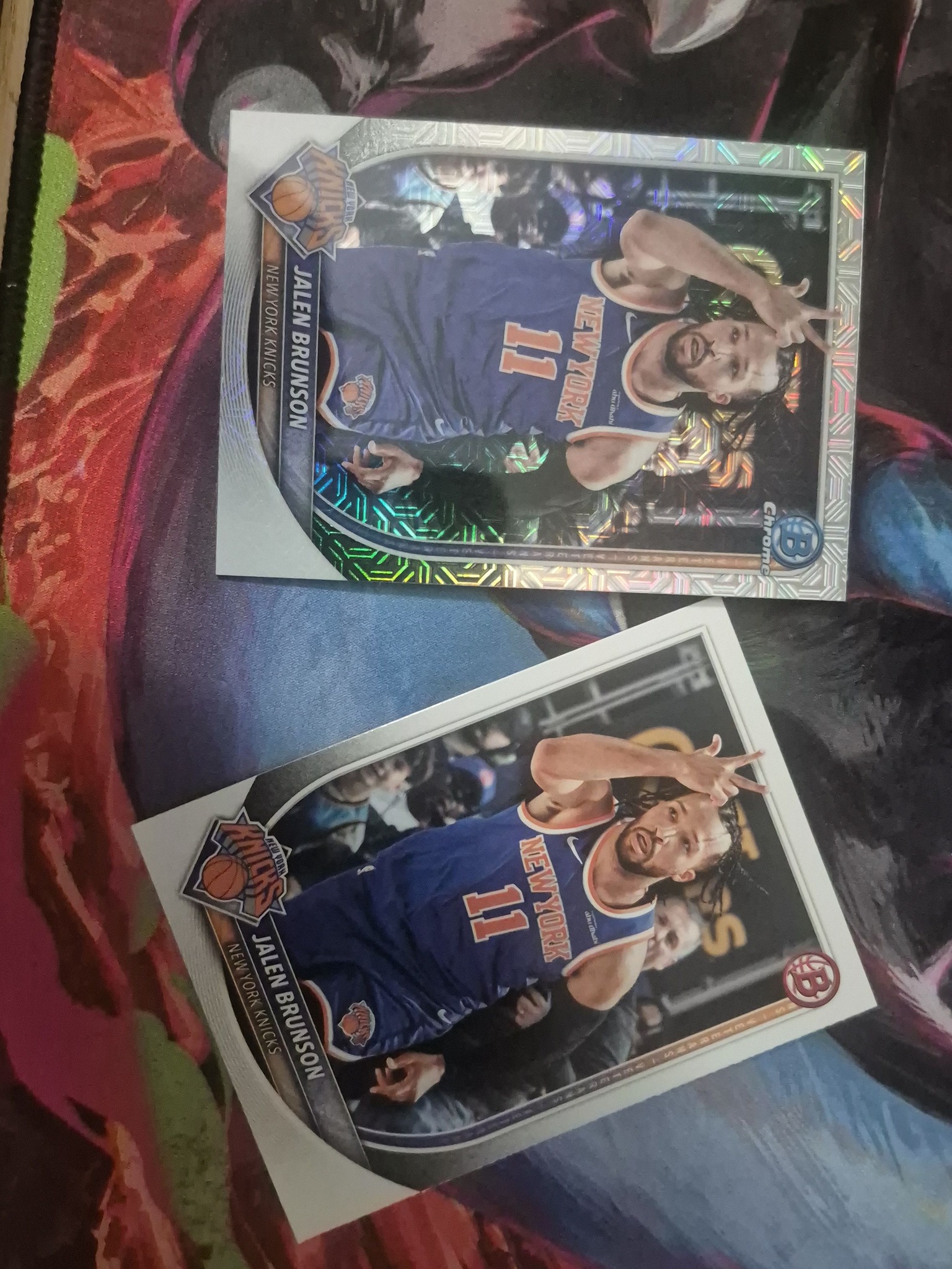 Jalen Brunson sports cards including a Bowman Mega