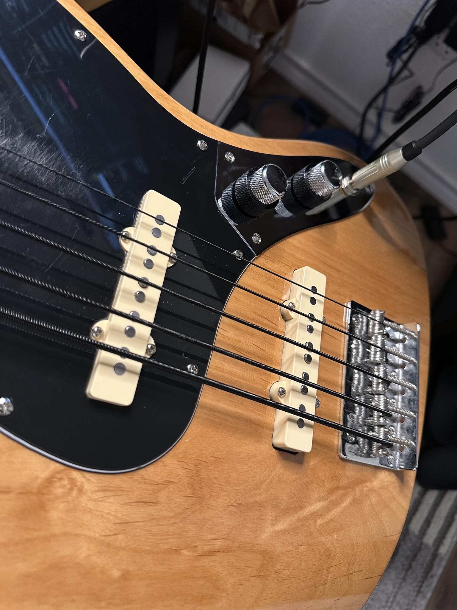 Upgraded Sire bass with Lindy Fralin pickups and control plate