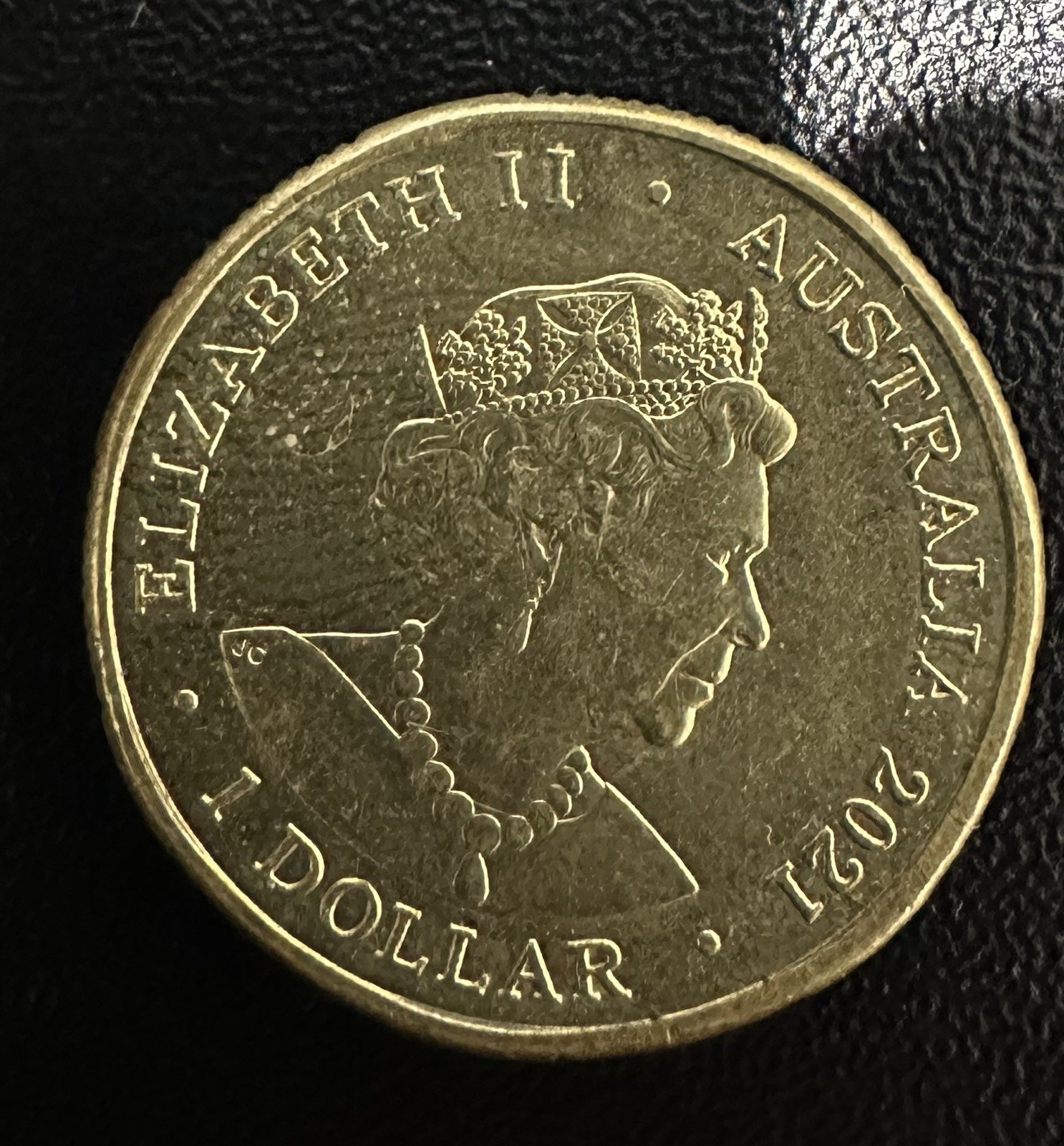 What is the value of a 2021 Donation dollar coin with a JC stamp?