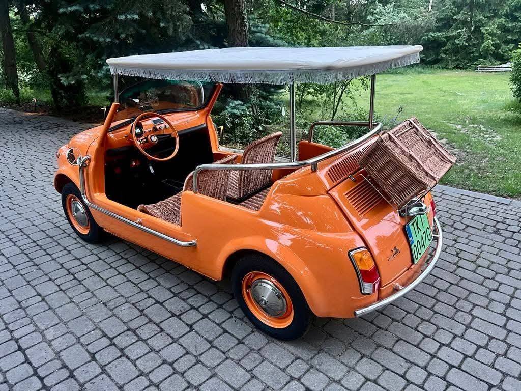 Here's a 1970 Fiat 500 Jolly Electric. TM HIAL 8종 客 AHB electric