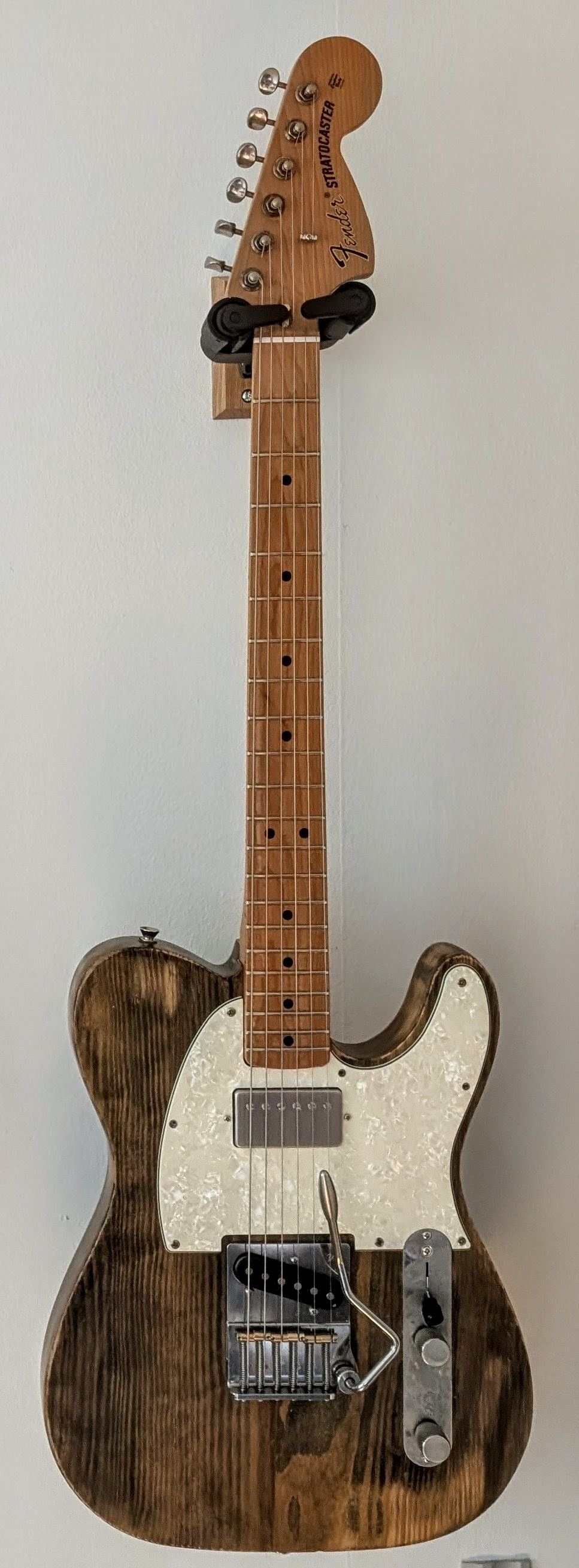 Telecaster guitar body with orange dye and Tru Oil finish