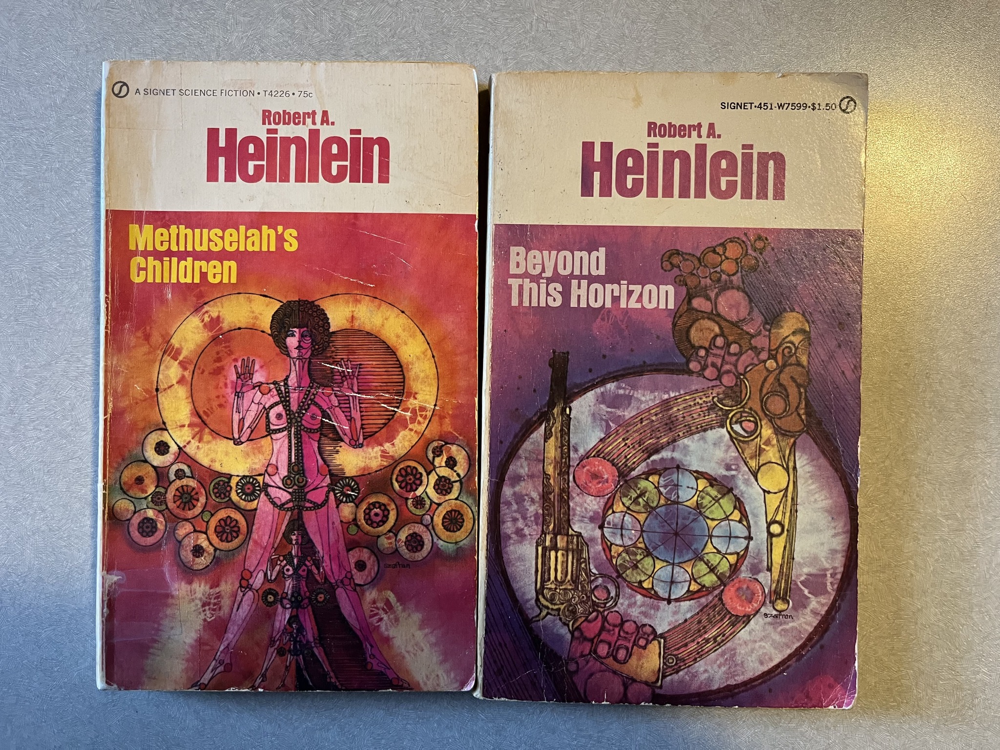 Two Robert A. Heinlein's I got this weekend.