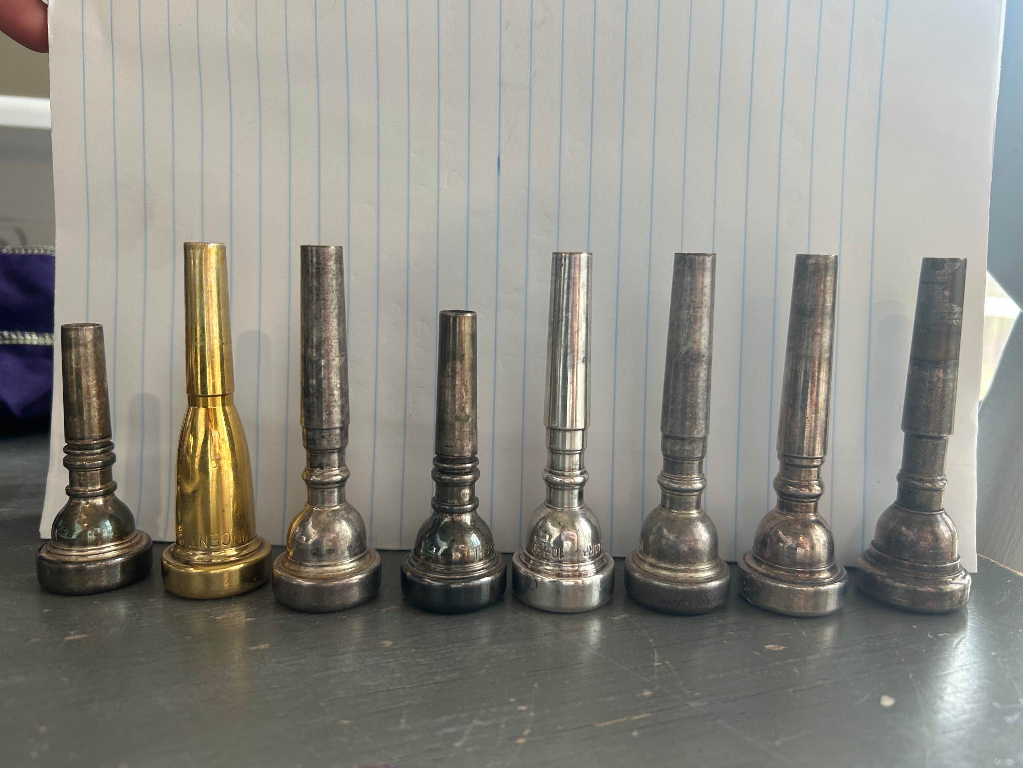 mouthpieces L→R Vincent Bach Corp 1C FL Viercent Bach 3C (gold 