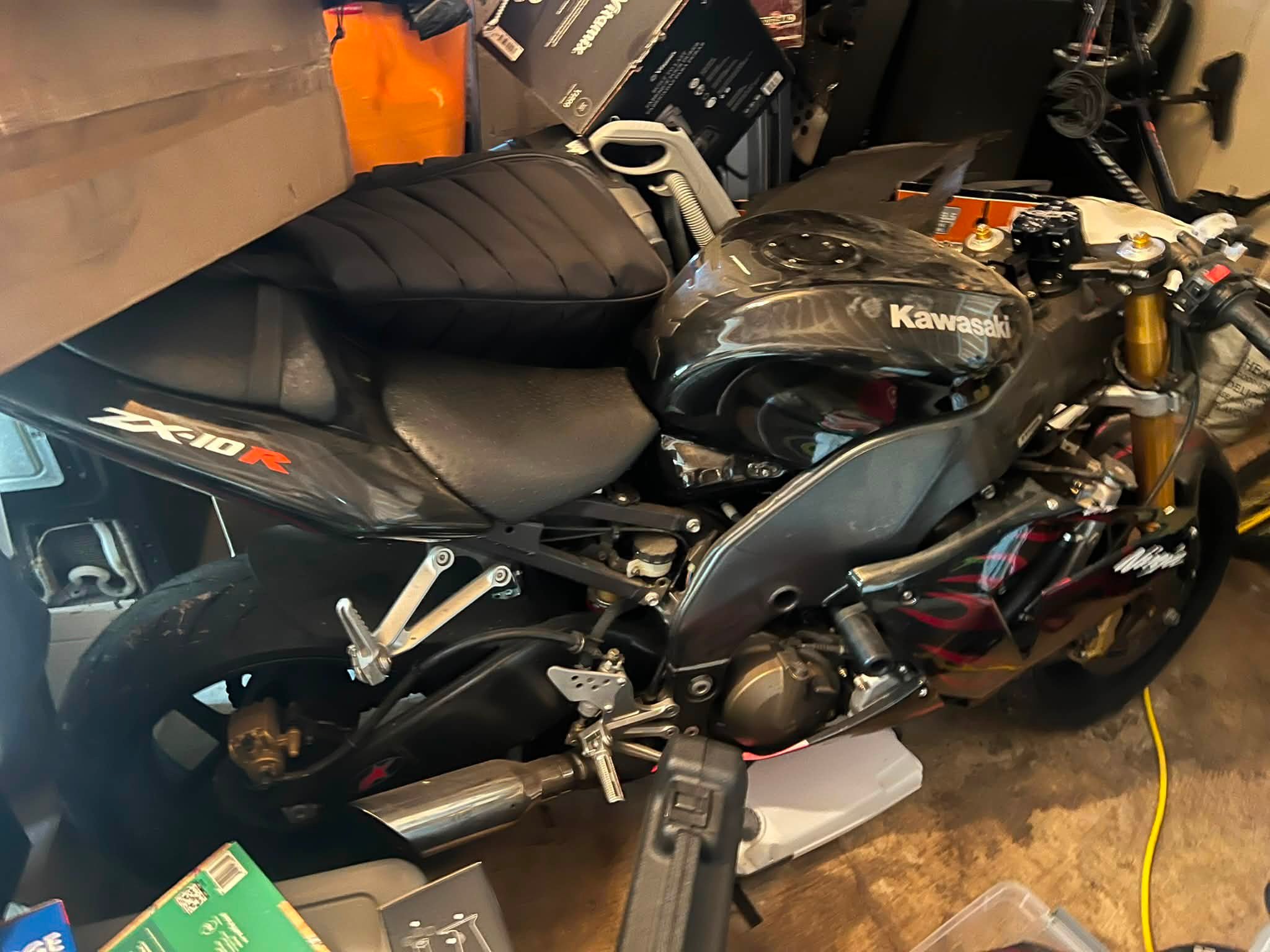 How much is a 2005 Kawasaki Ninja ZX-10R with front damage worth?