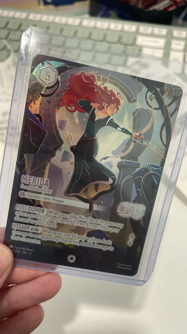 Pulled iconic Merida card from Disney Lorcana TCG blister pack