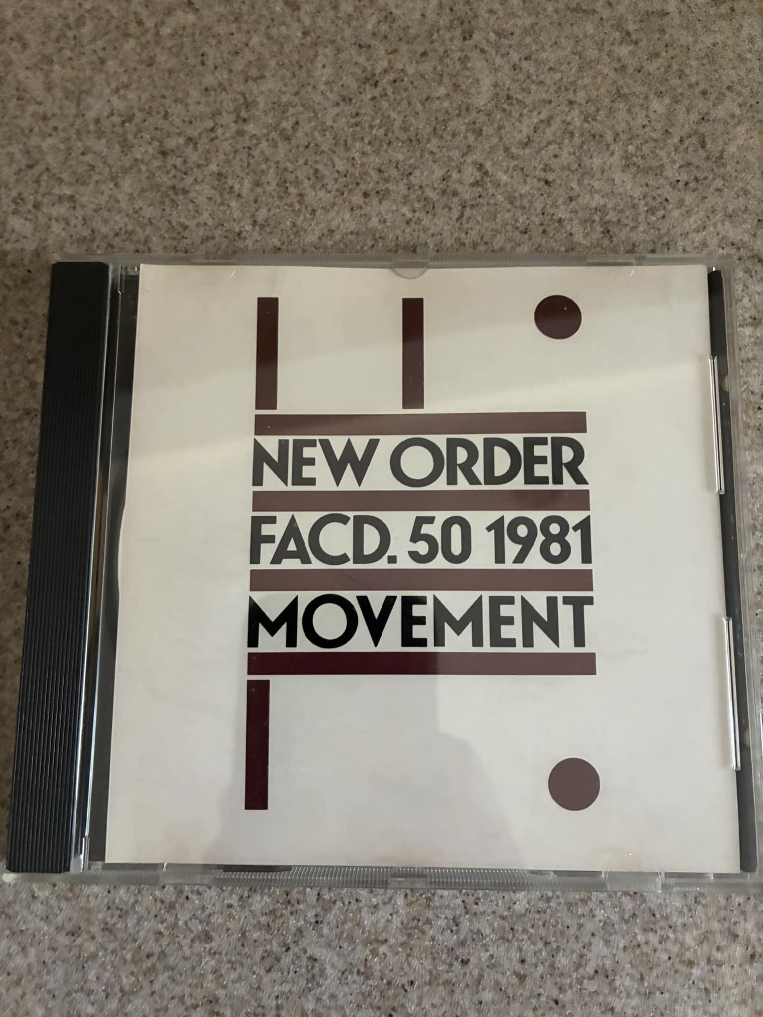 Is white/brown cover an earlier pressing?