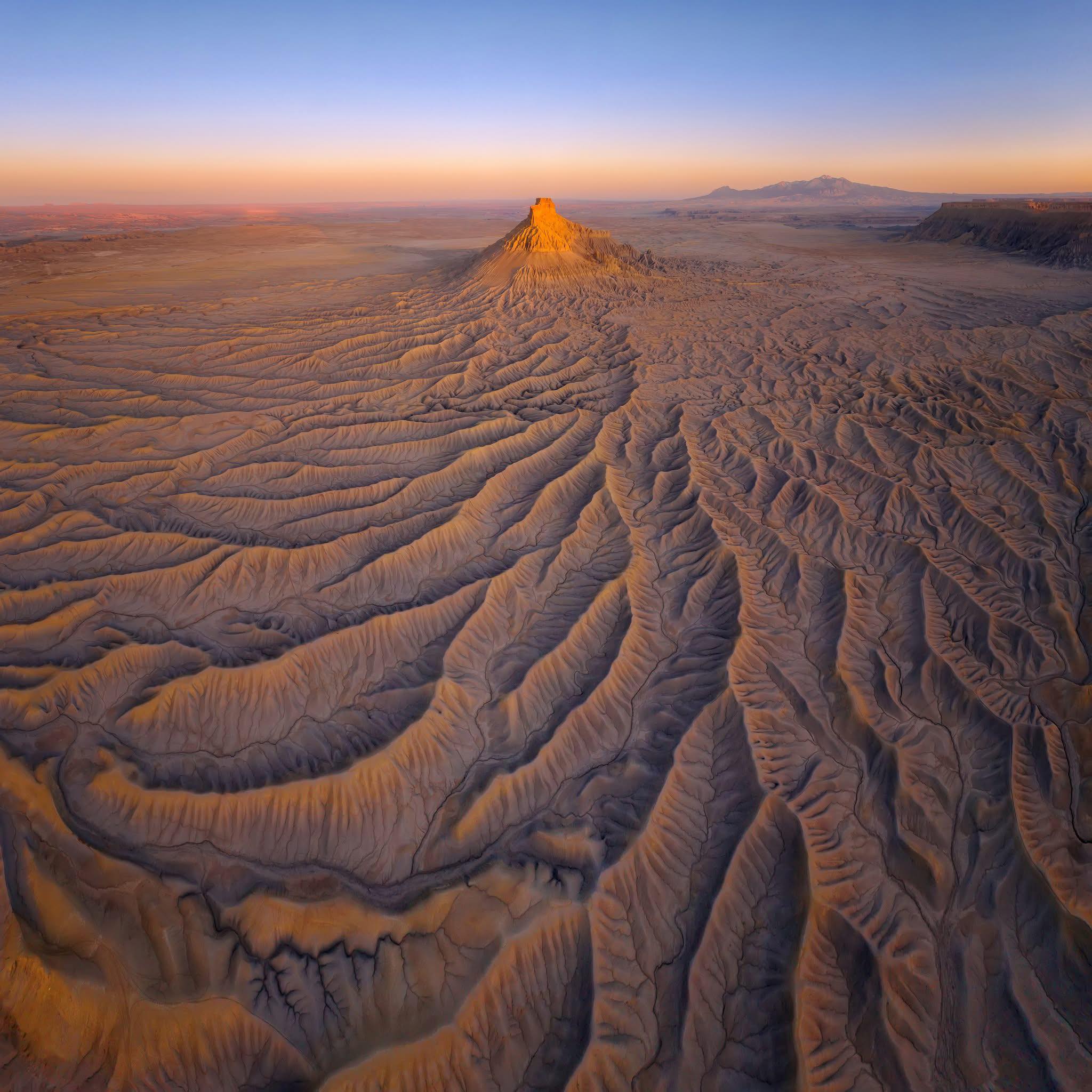 Kah-Wai - Aerial view of the Utah Badlands. Badlands are arid ...