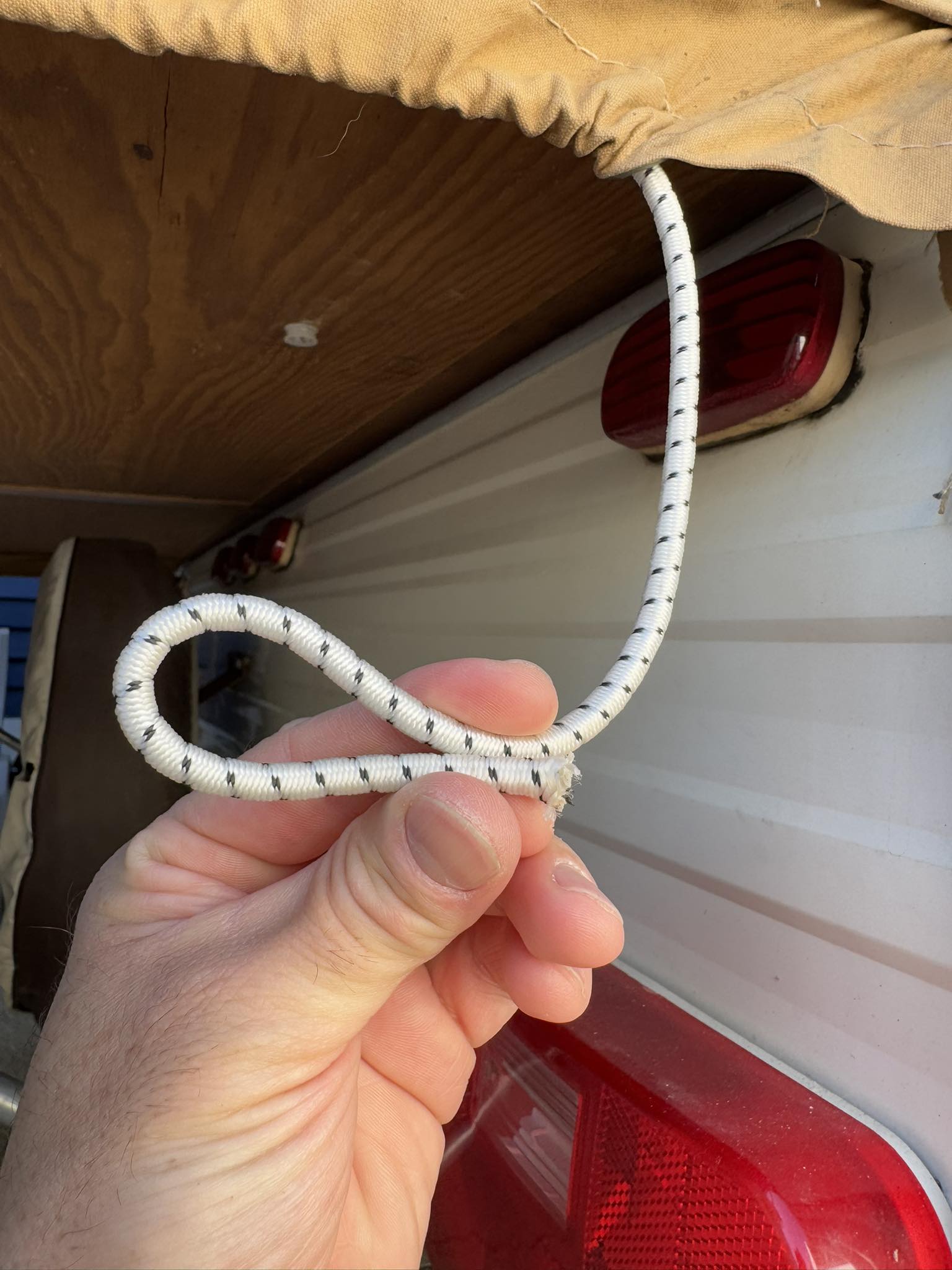 How to loop repaired string back to pulley system?