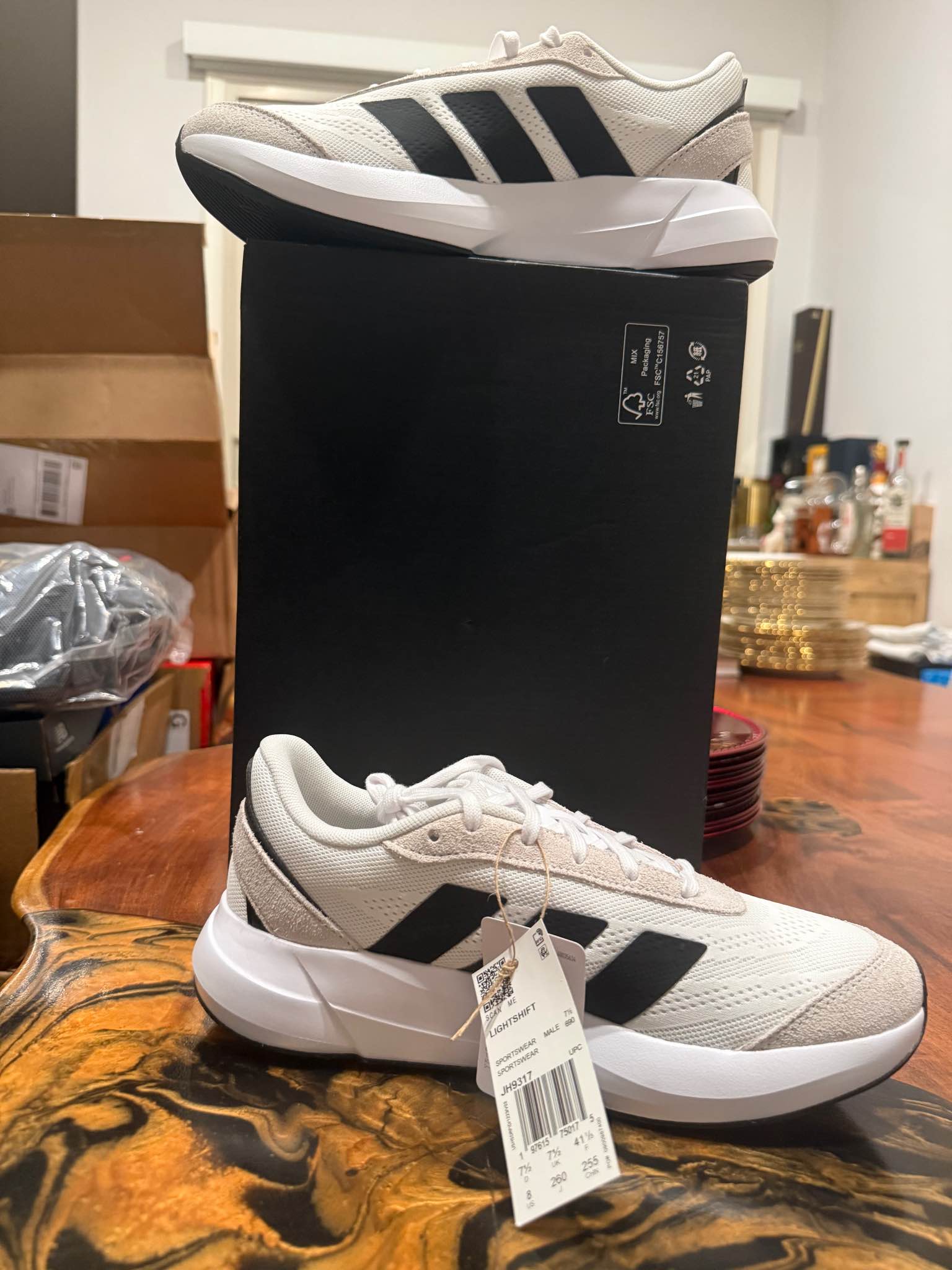 New Adidas Lightshift sneakers in white and black. These shoes are