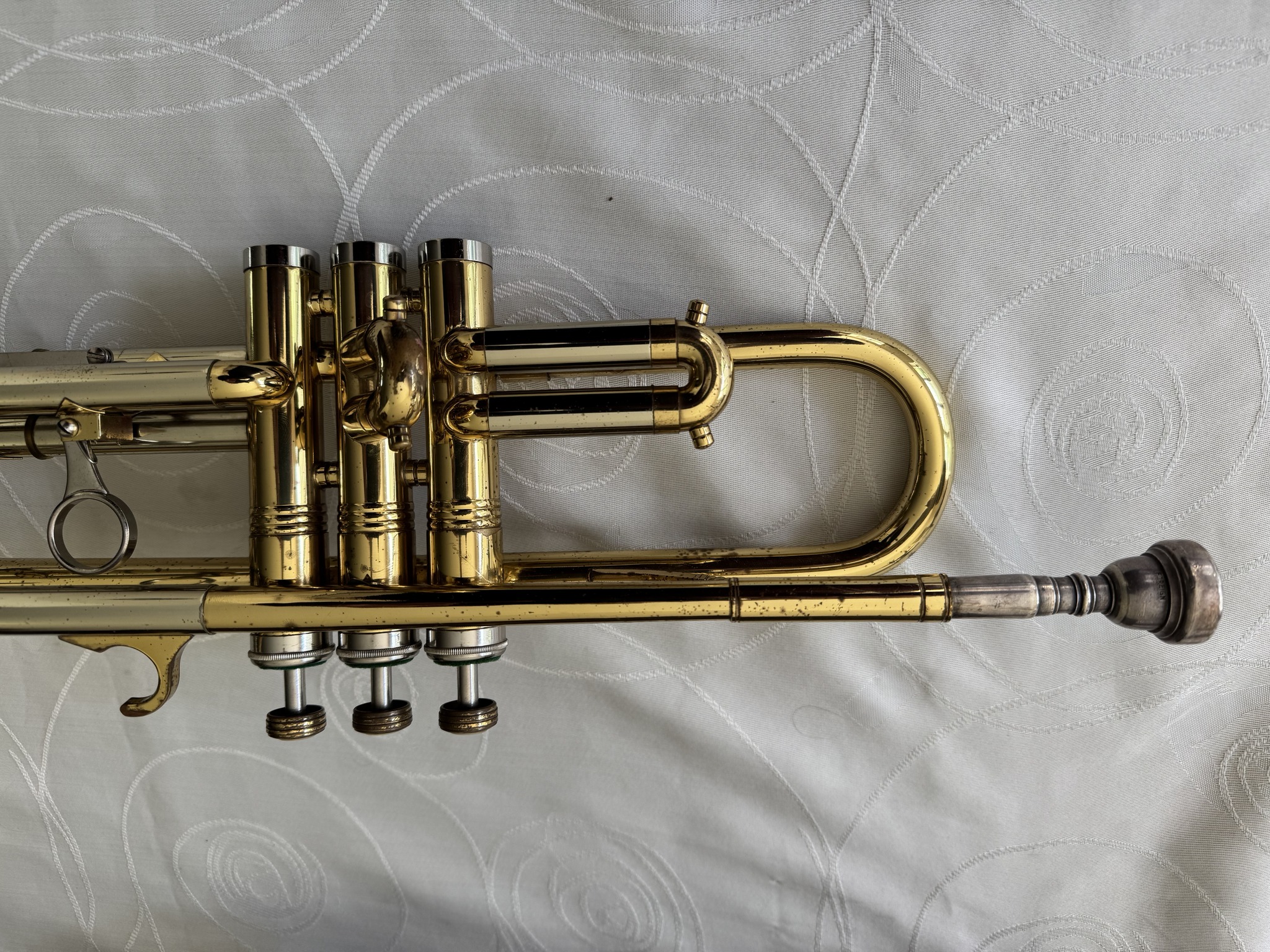 What is the value of an old Invicta trumpet?