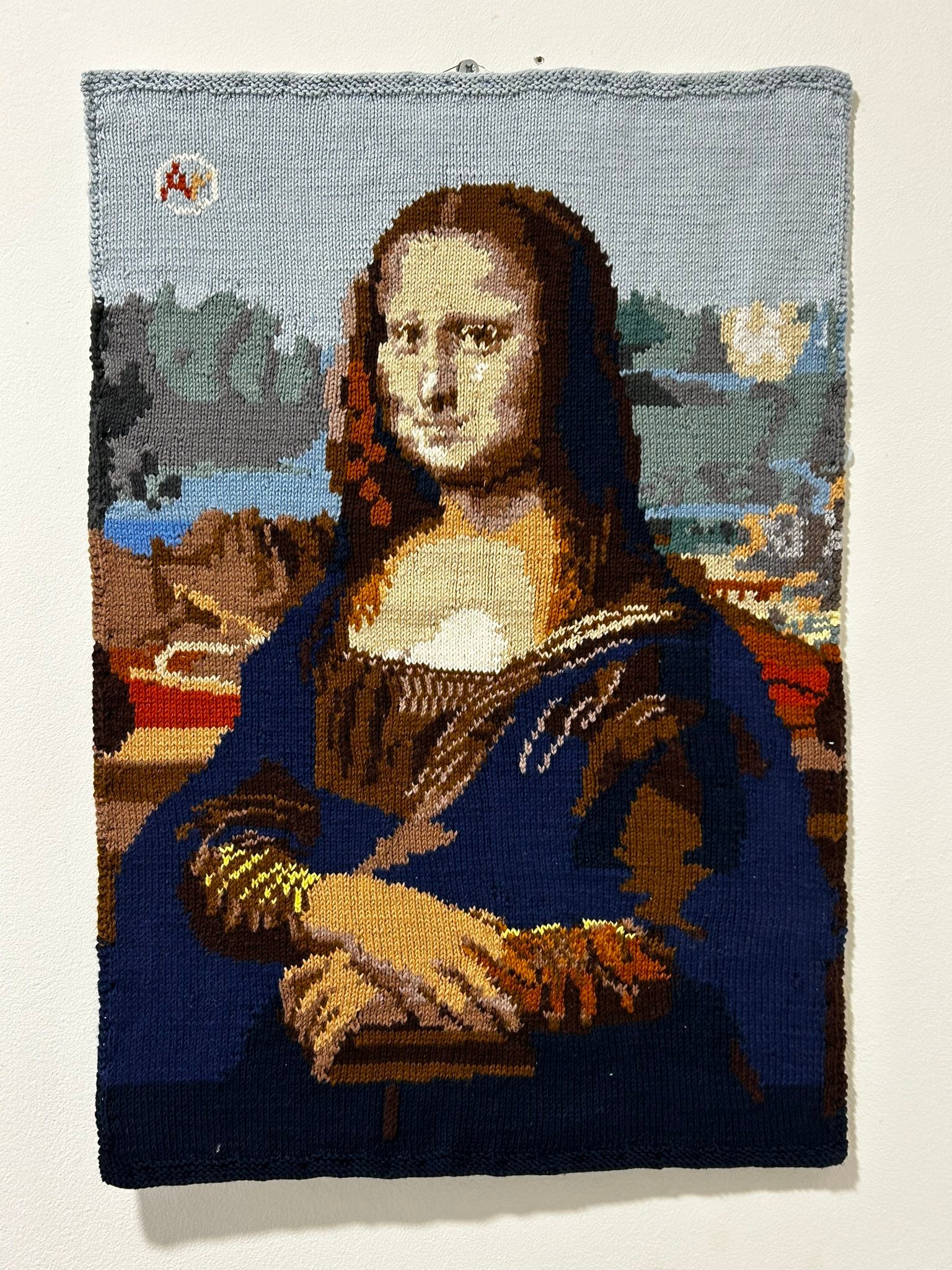 Knitted Mona Lisa with mysterious smile