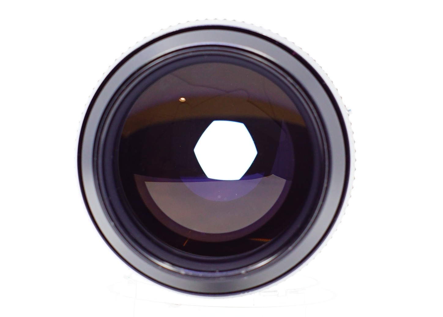 Does anyone have experience with the Sankyo Kohki Komura 105mm f2