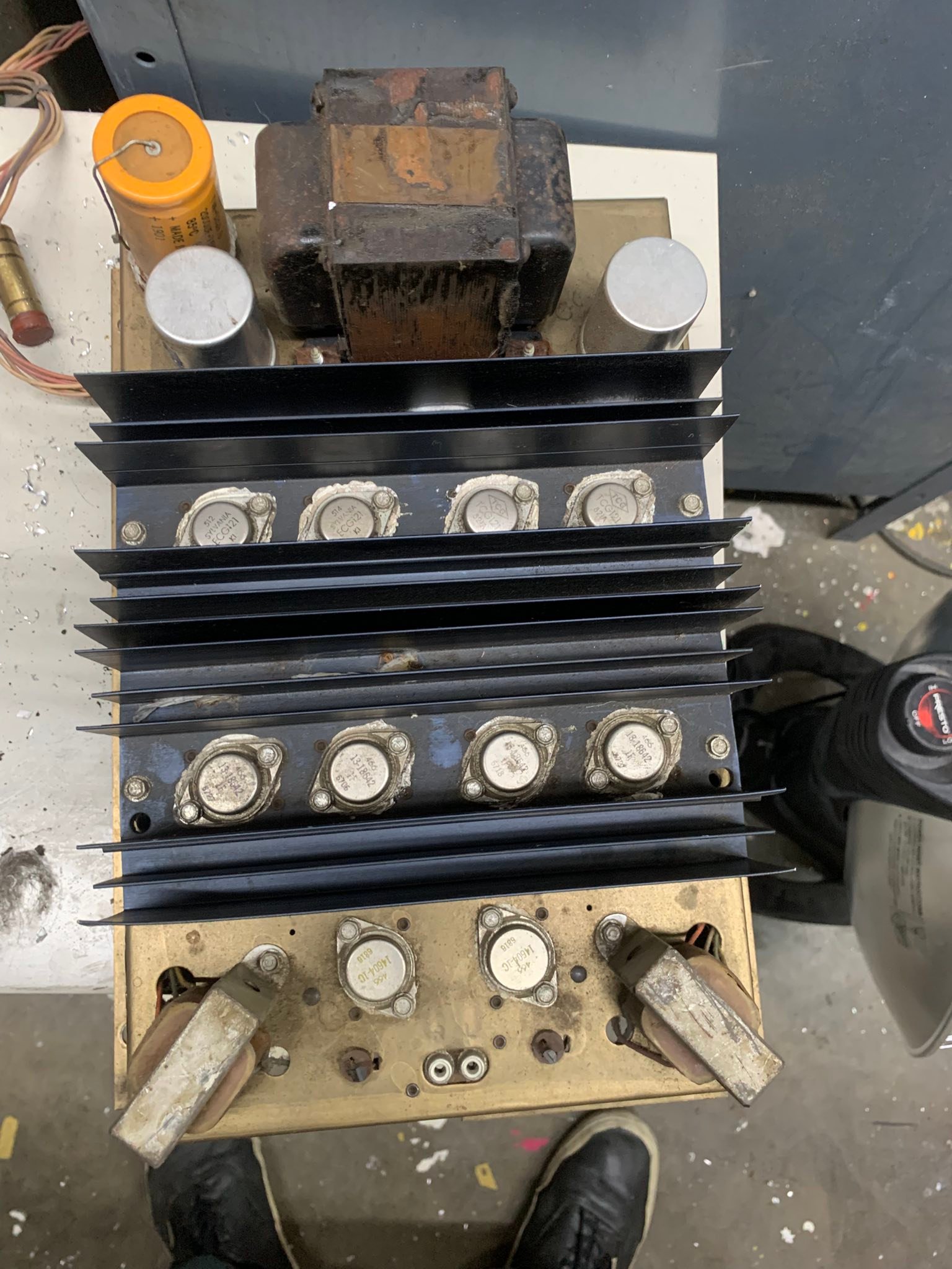 What is this vintage solid state amplifier and is it worth fixing?