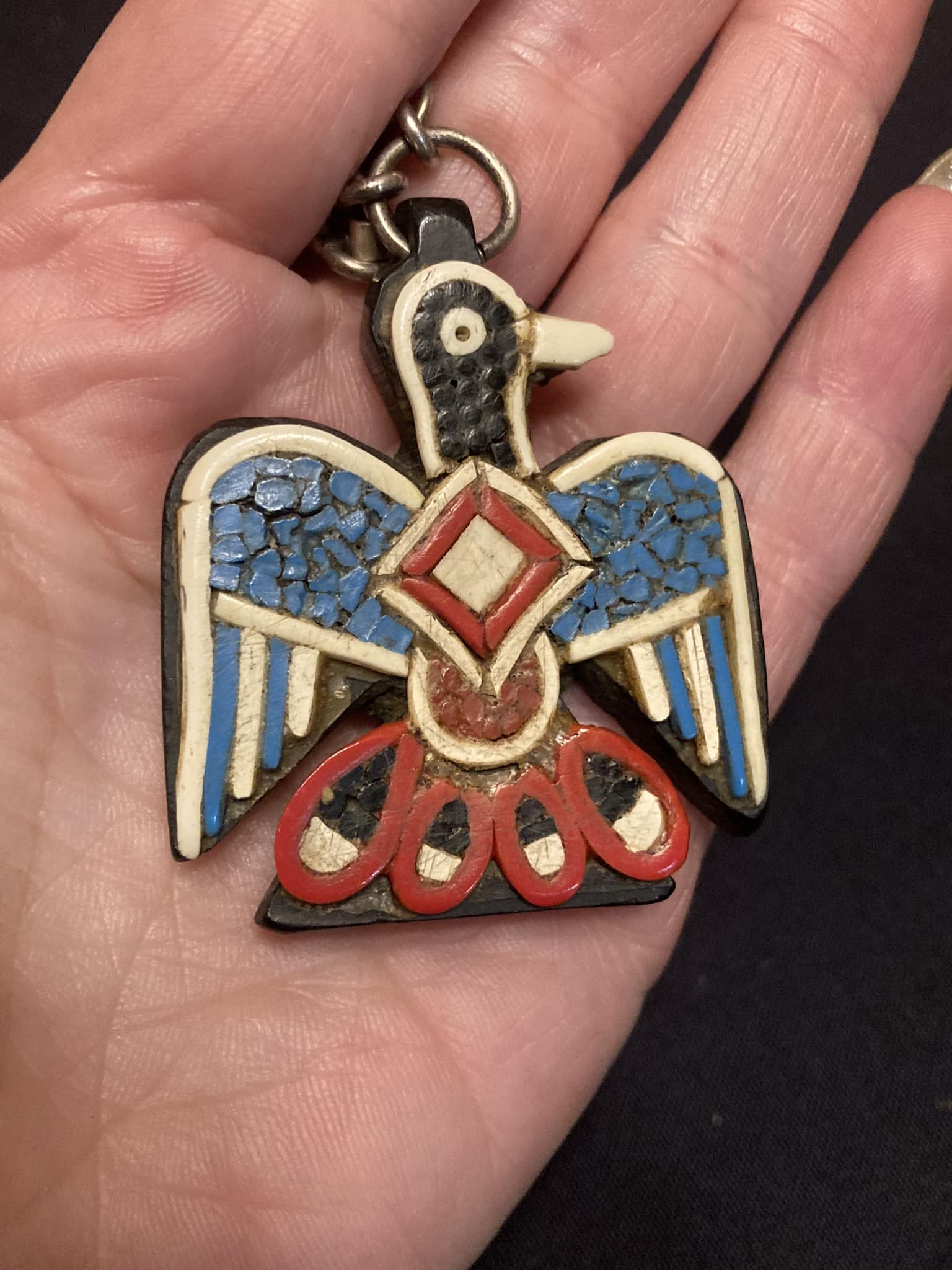 Identifying santo domingo pueblo battery thunderbird necklace?