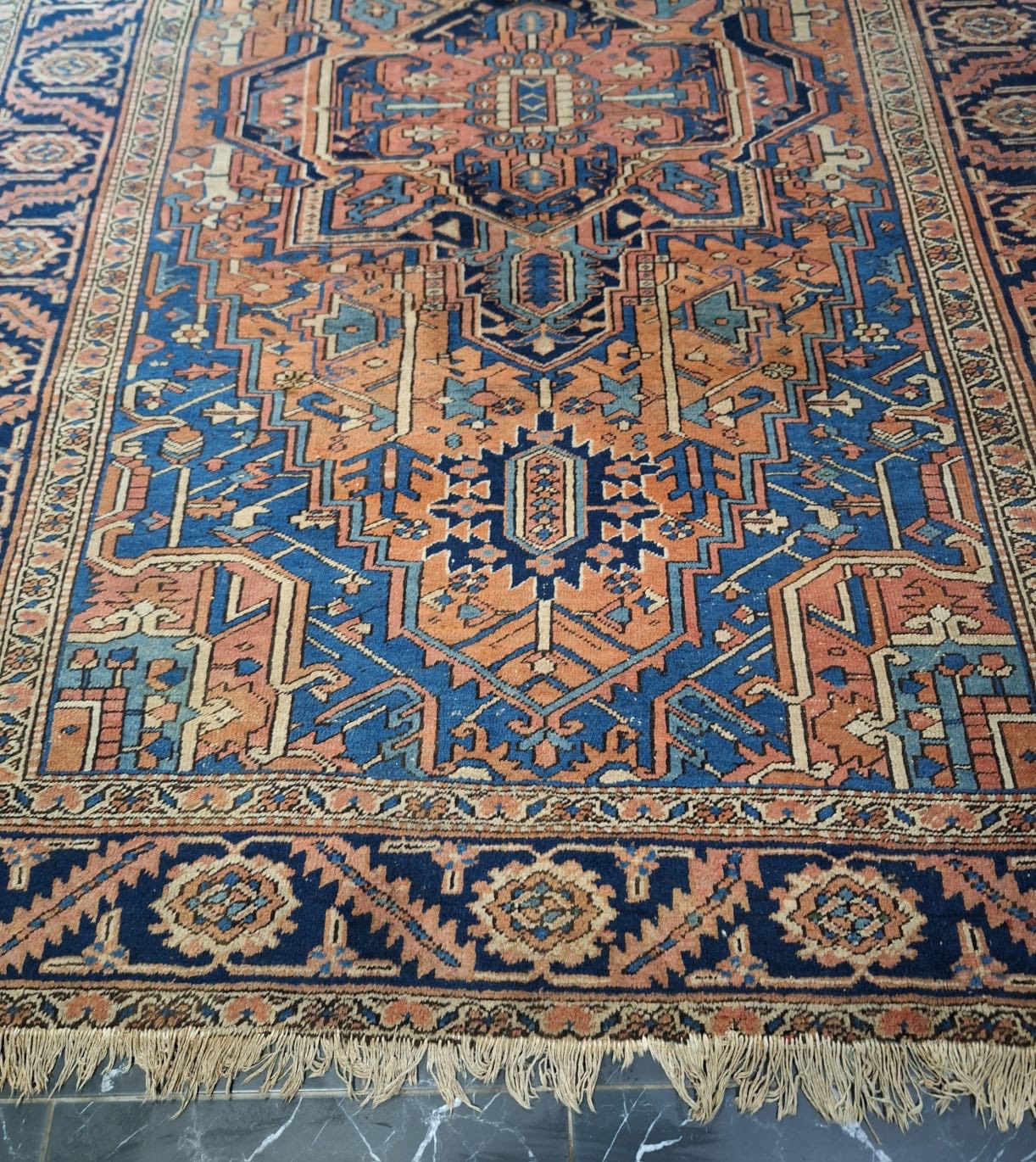 What type of rug is this Heriz-style rug with Bakshaish colors?