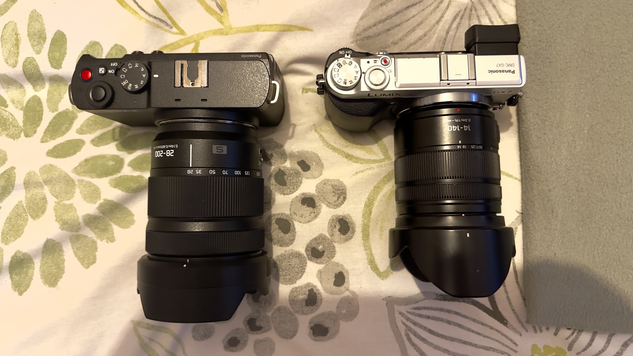 Lumix S9 with 28-200 next to the Lumix GX7 with 14-140 II. Not
