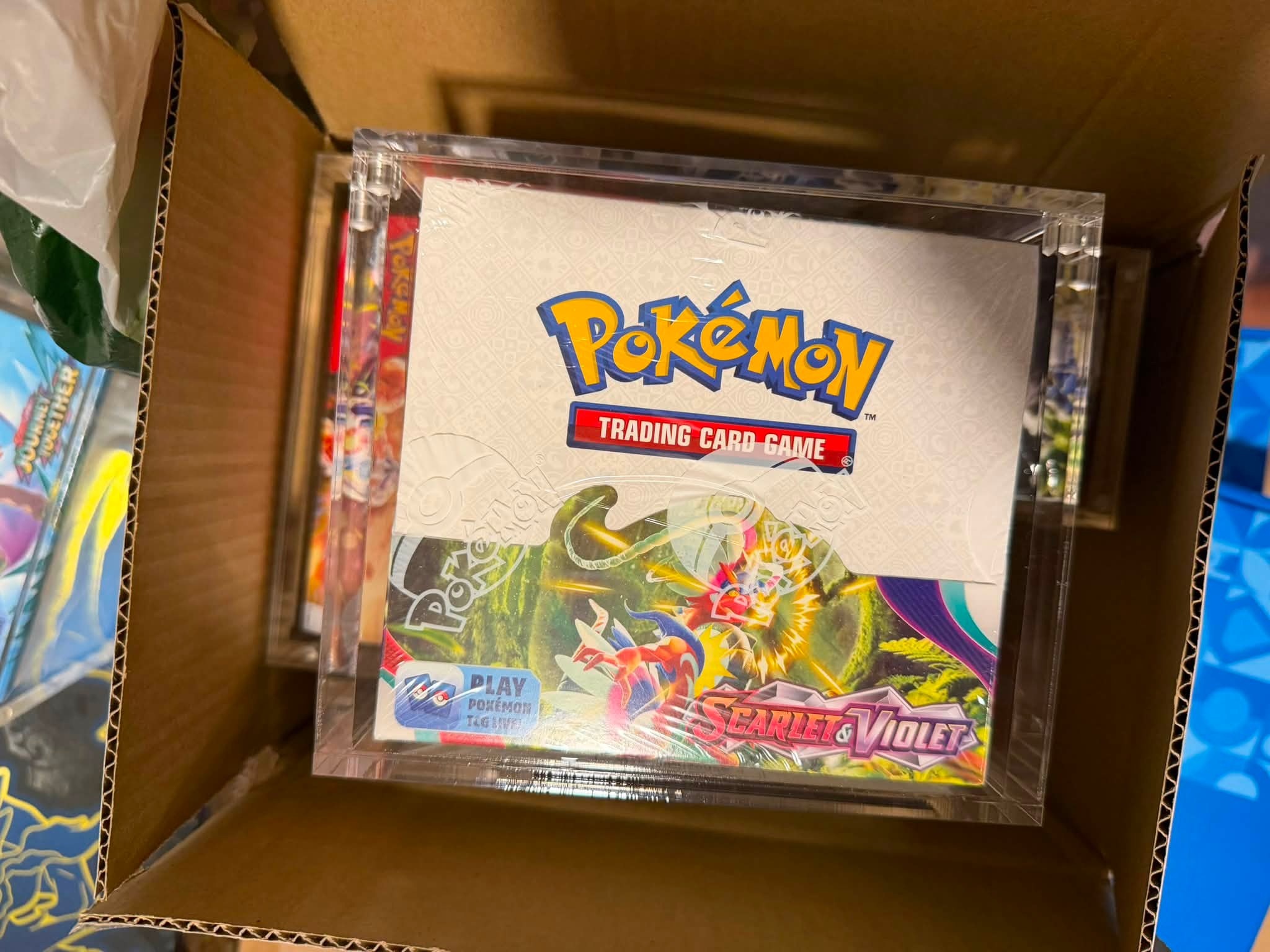pokemon scarlet and violet booster box price Japanese: Night Wanderer Battle it out with friends to see who comes out on top pokemon-scarlet-violet-prismatic-evolutions-booster-pack -593054.png?v=1737186265&width=533