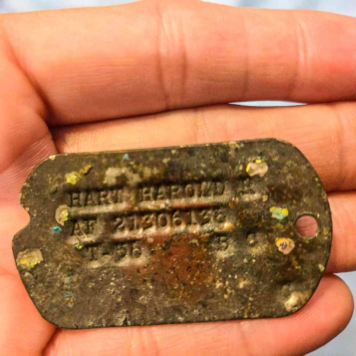What are triangle thing and jars found with vintage dog tag and 