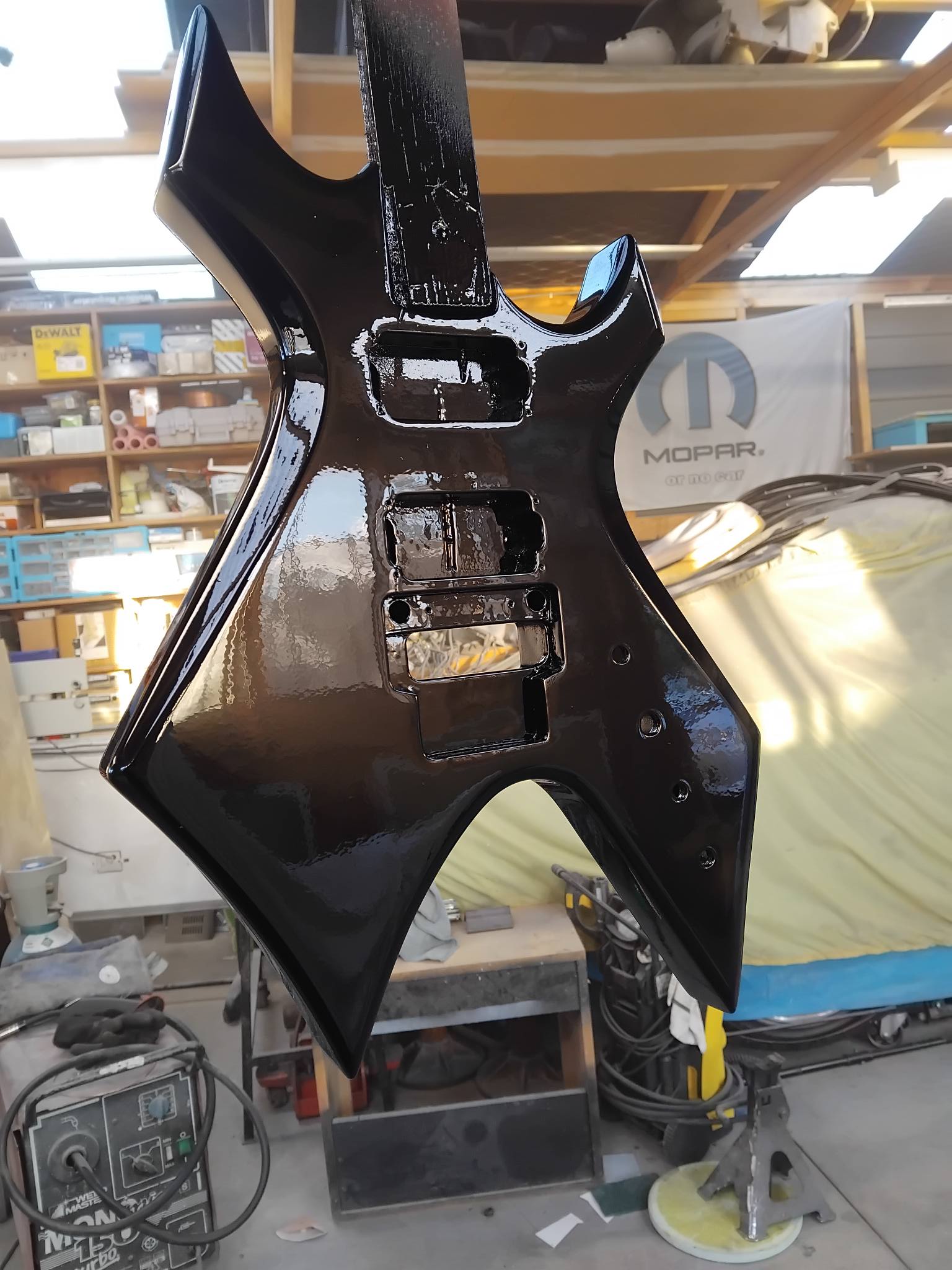 Refinished Samick Warlock guitar with custom artwork and hardware