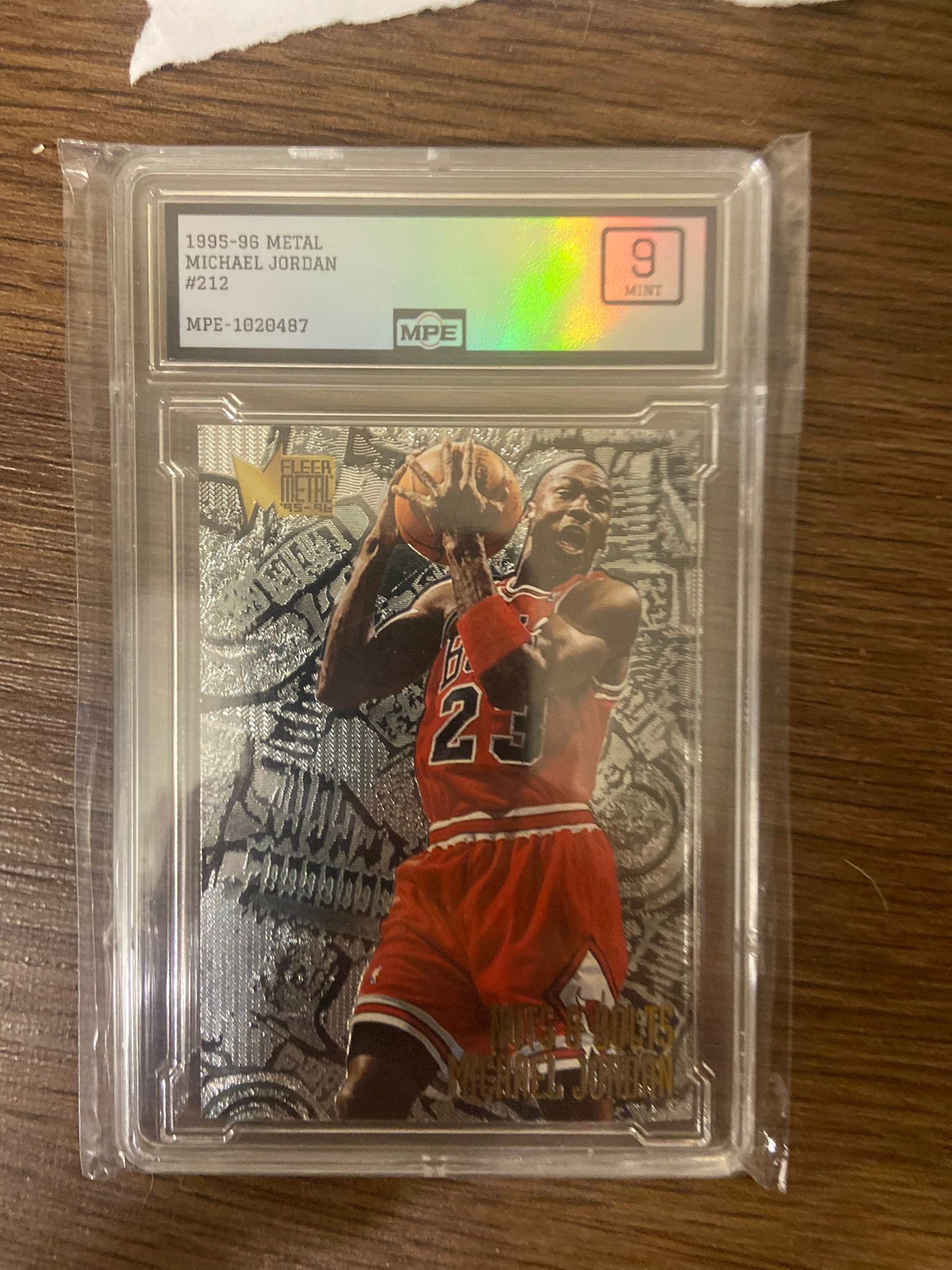 1995-96 Fleer Metal Nuts & Bolts #212 Michael Jordan Graded 9