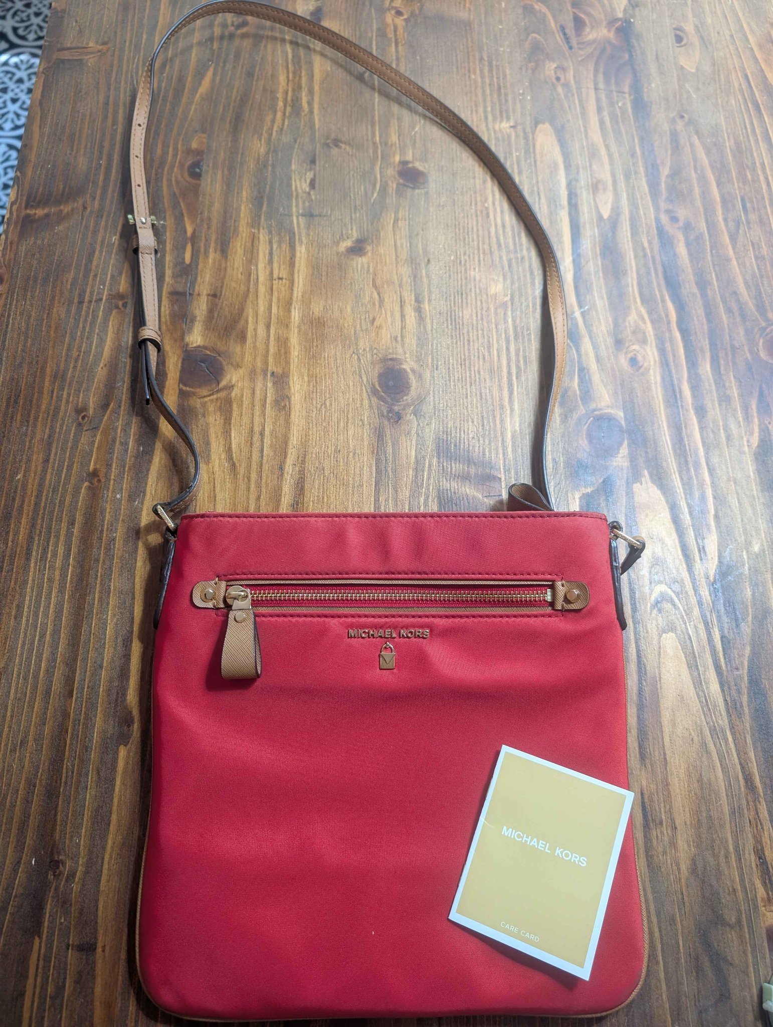 Michael Kors Kelsey crossbody nylon red bag with tan leather strap 