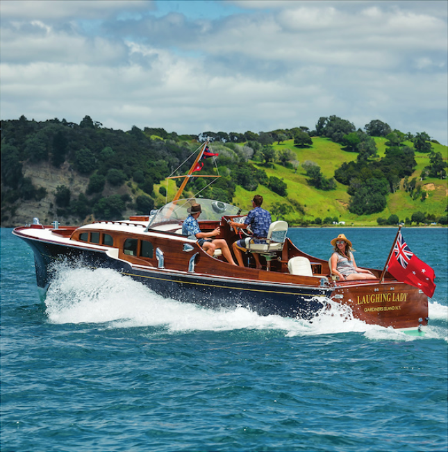WoodenBoat The 33' powerboat cruiser LAUGHING LADY was...