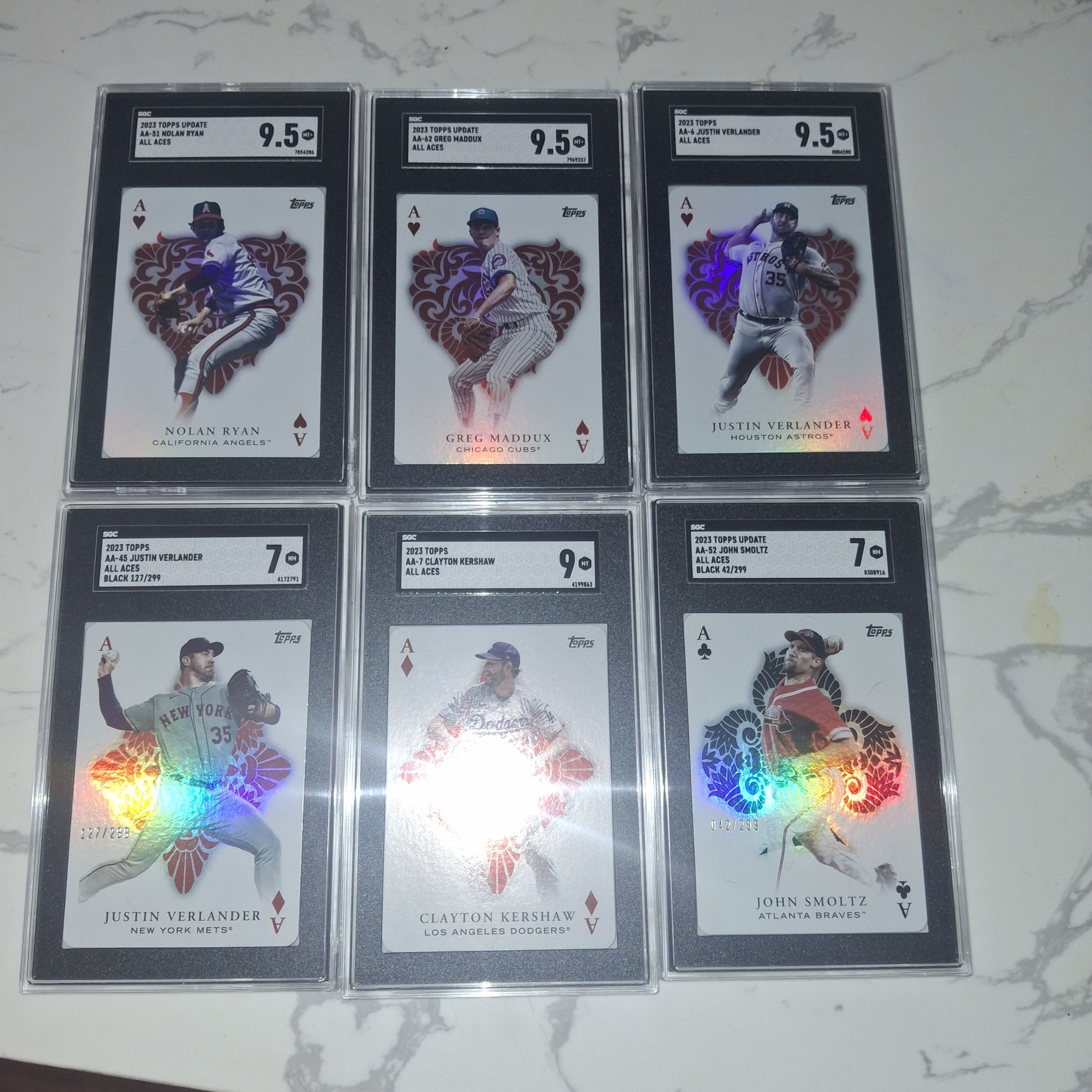 High-end sports cards for sale, including Nolan Ryan and Justin 