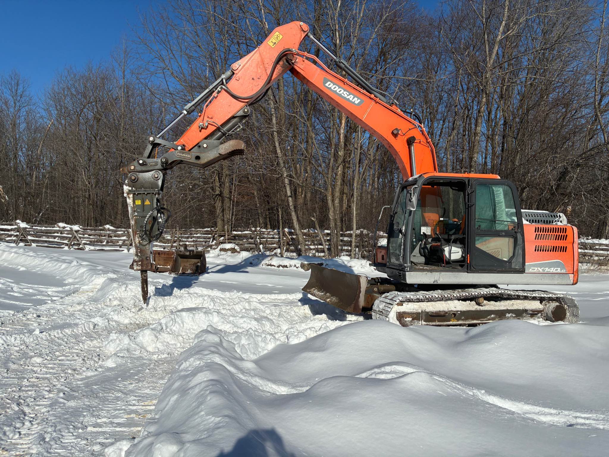 Strong, compact Kobelco excavator ready to work. Approximately