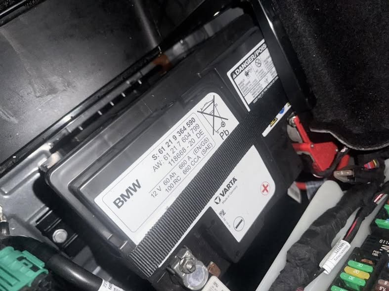 Replacing auxiliary battery in BMW 530e