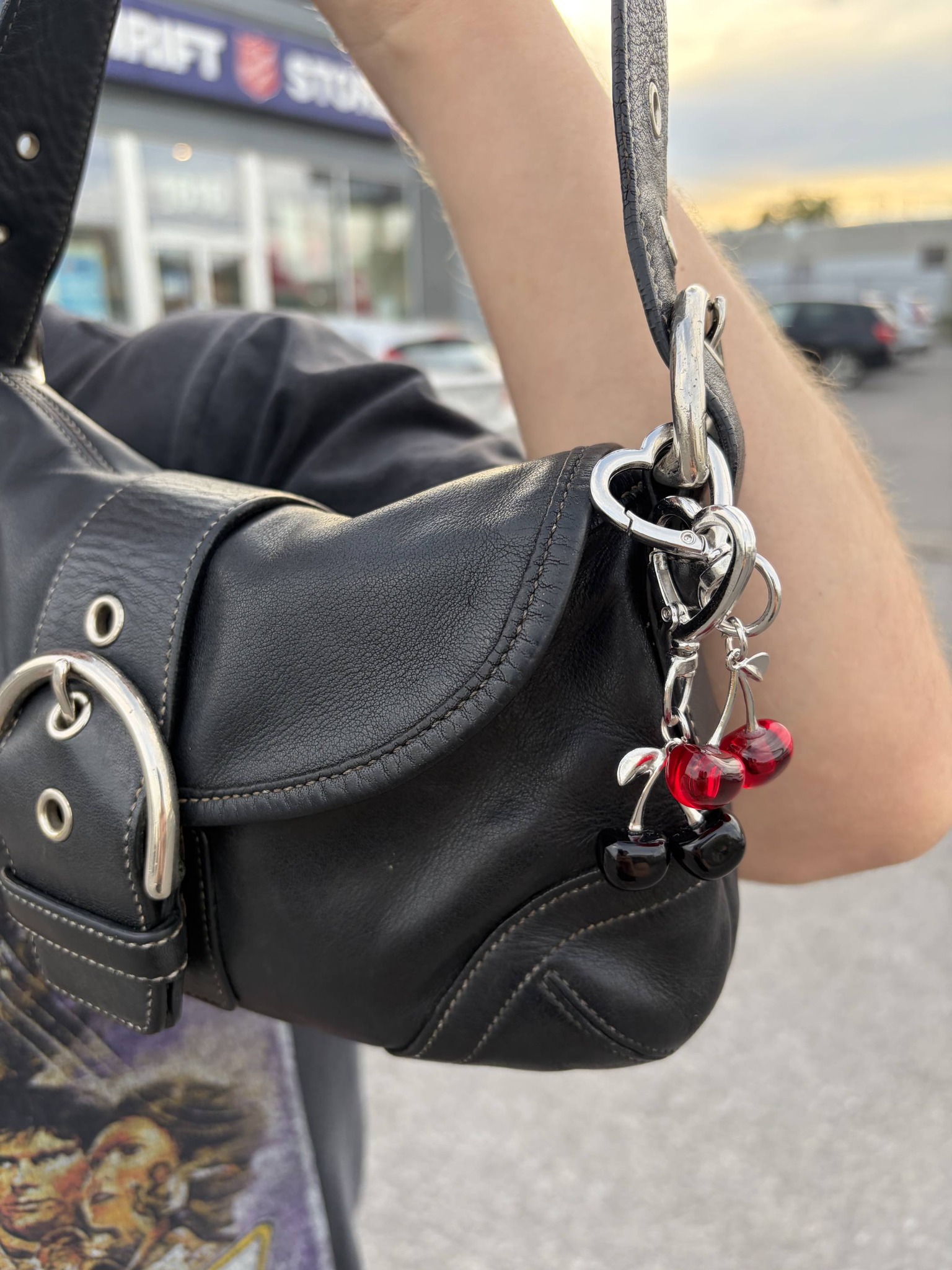 Carrying my 2004 black leather Soho flap bag today