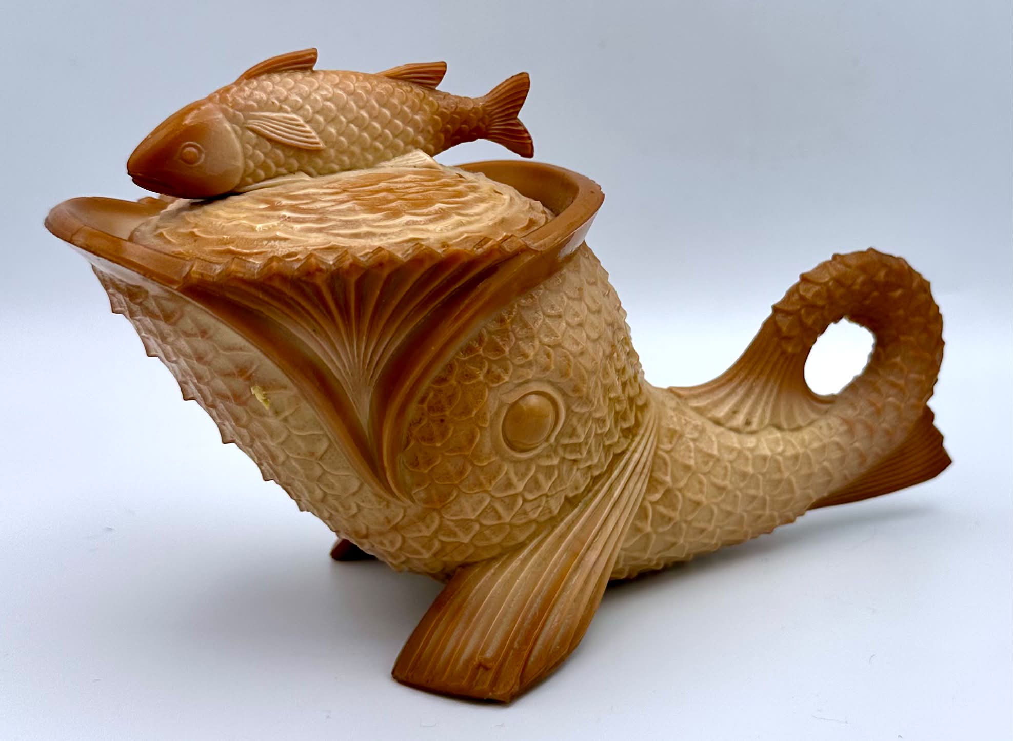 Indiana Tumbler and Goblet Company's Greentown glass dolphin fish
