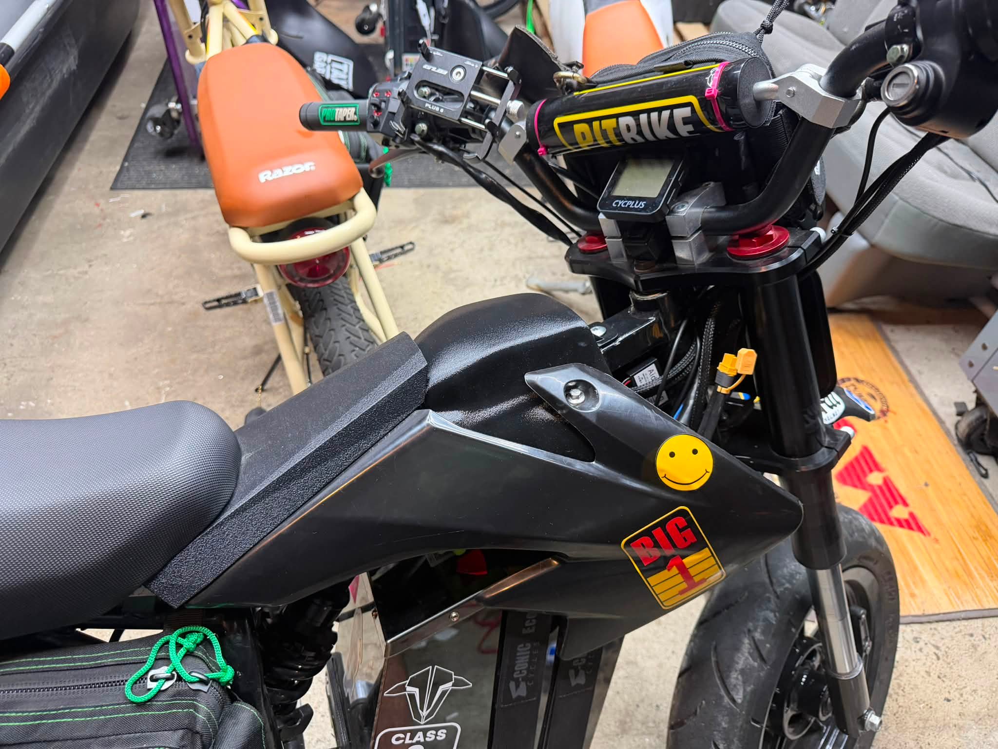 Modified gas tank with cap delete on dirt bike