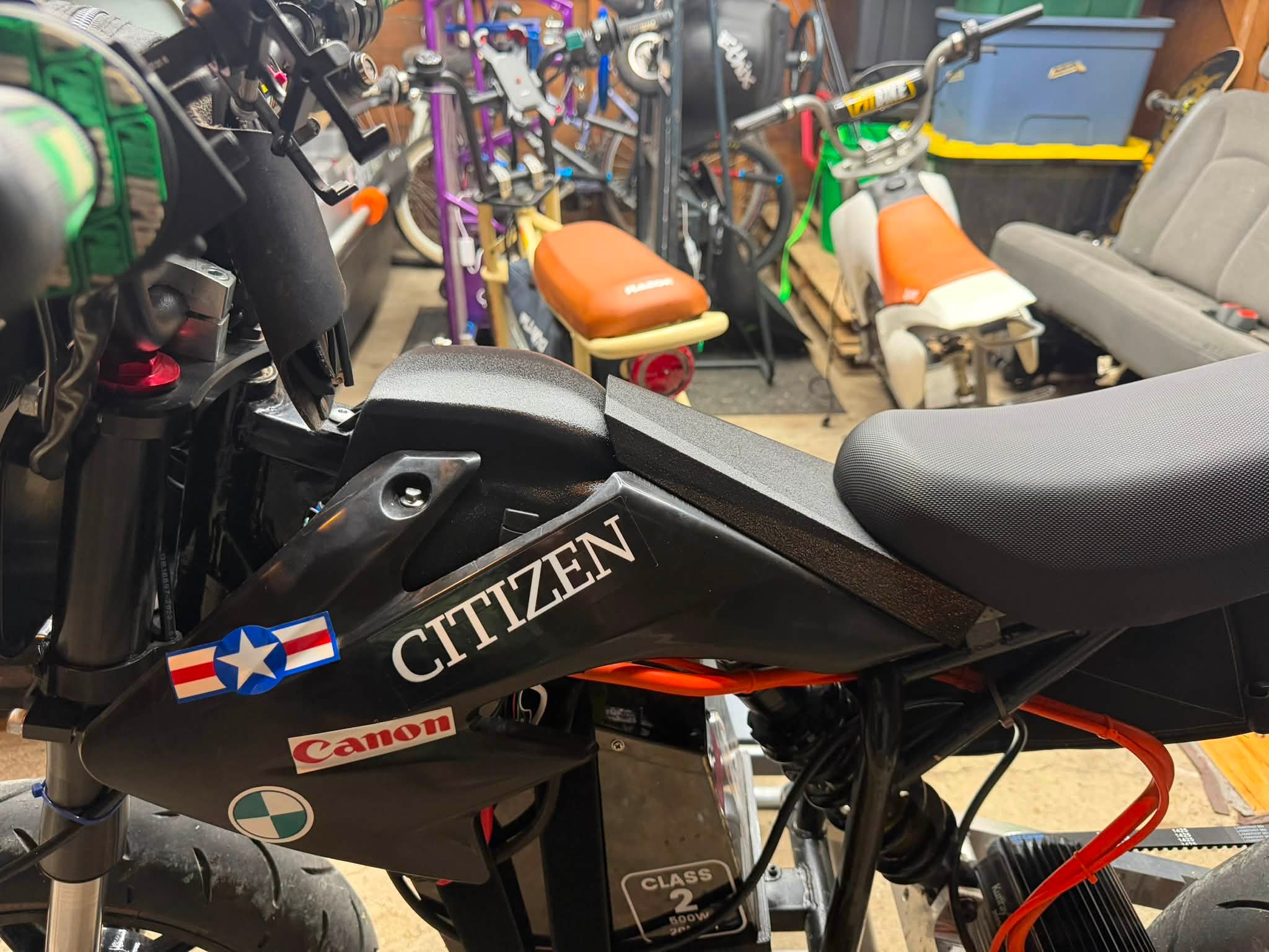 Modified gas tank with cap delete on dirt bike