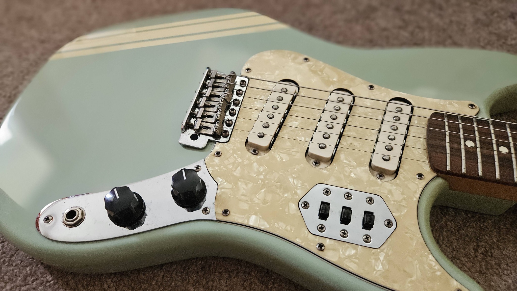 What is a blue Fender Cyclone Squier guitar?