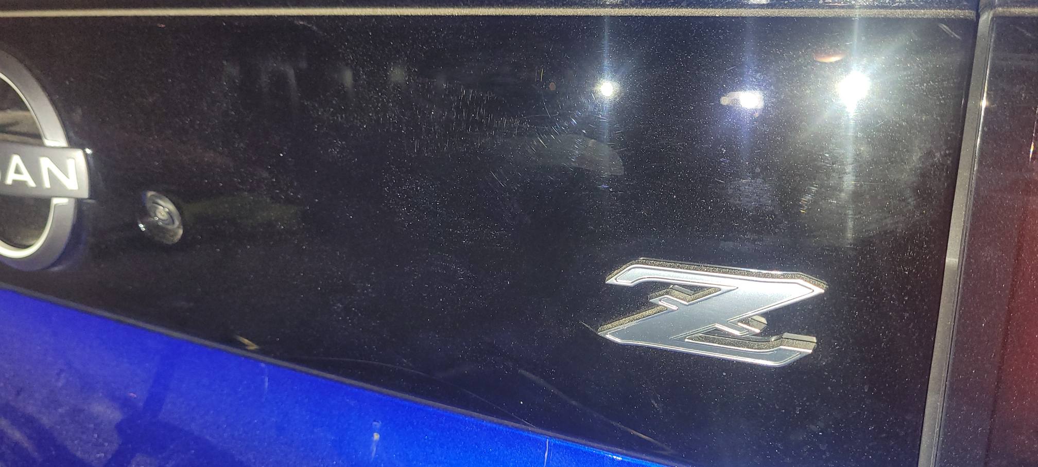 Is Nissan Z logo on back piece plastic or metal?