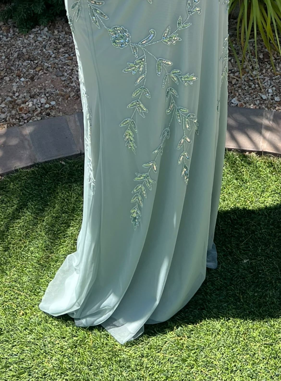 Seamstress needed to hem light green bridesmaid dress with tulle and lining in Vistancia