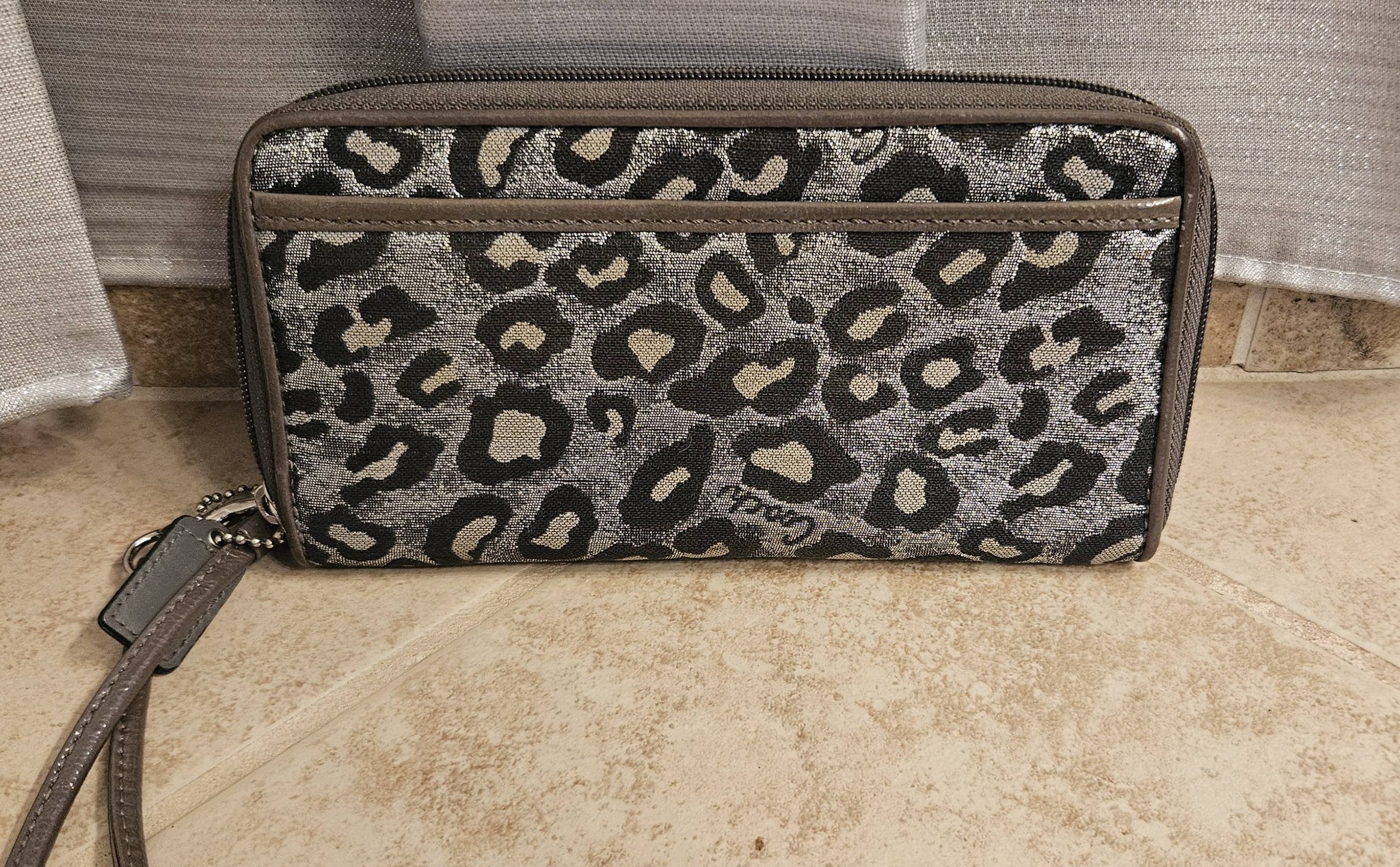 Rare Coach handbags, including kimono and ocelot prints, showcased