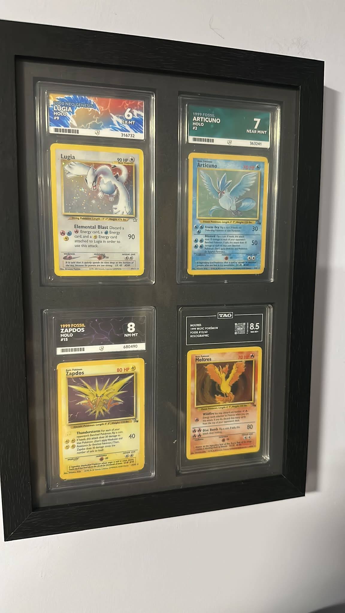 Lugia, Articuno, and Zapdos Pokémon card display collection
