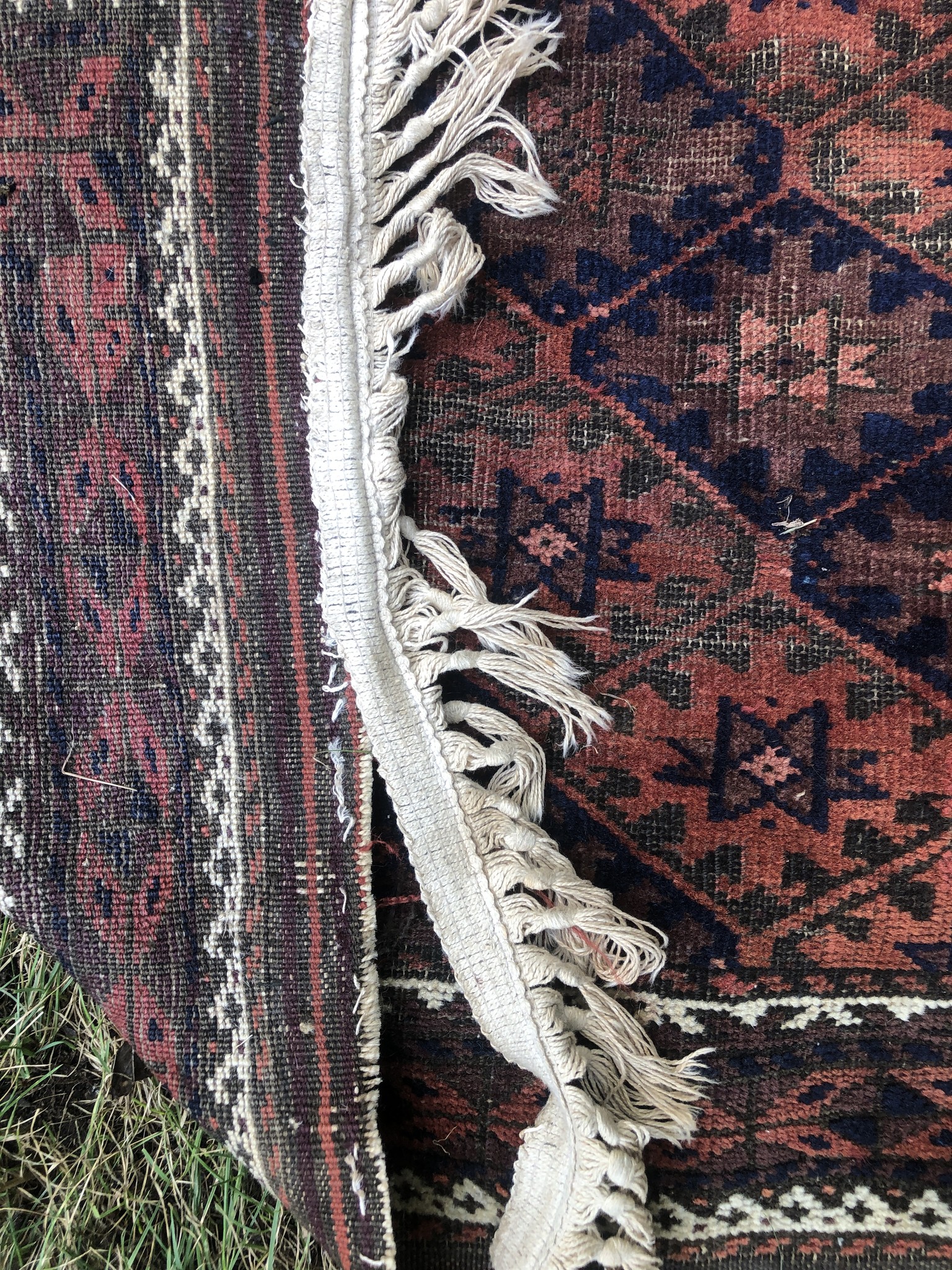 Identifying a vintage baluch rug?