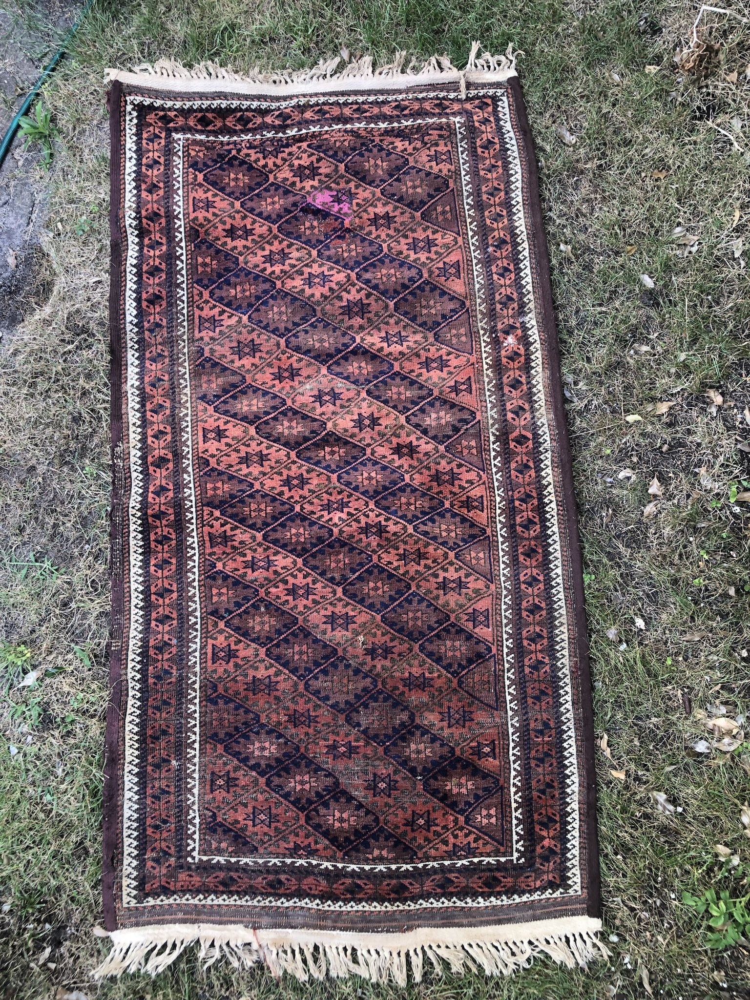 Identifying a vintage baluch rug?