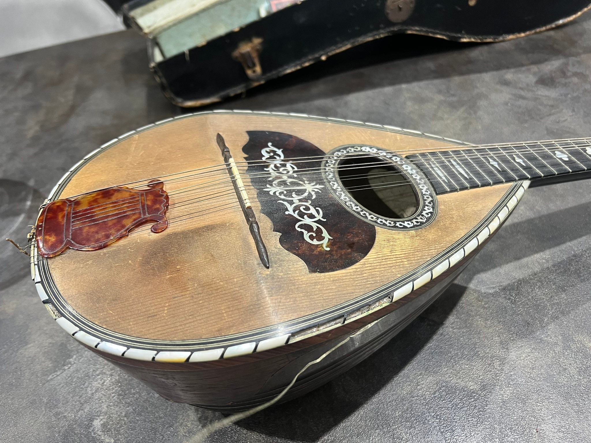 What is a Catania Carmelo mandolin worth?