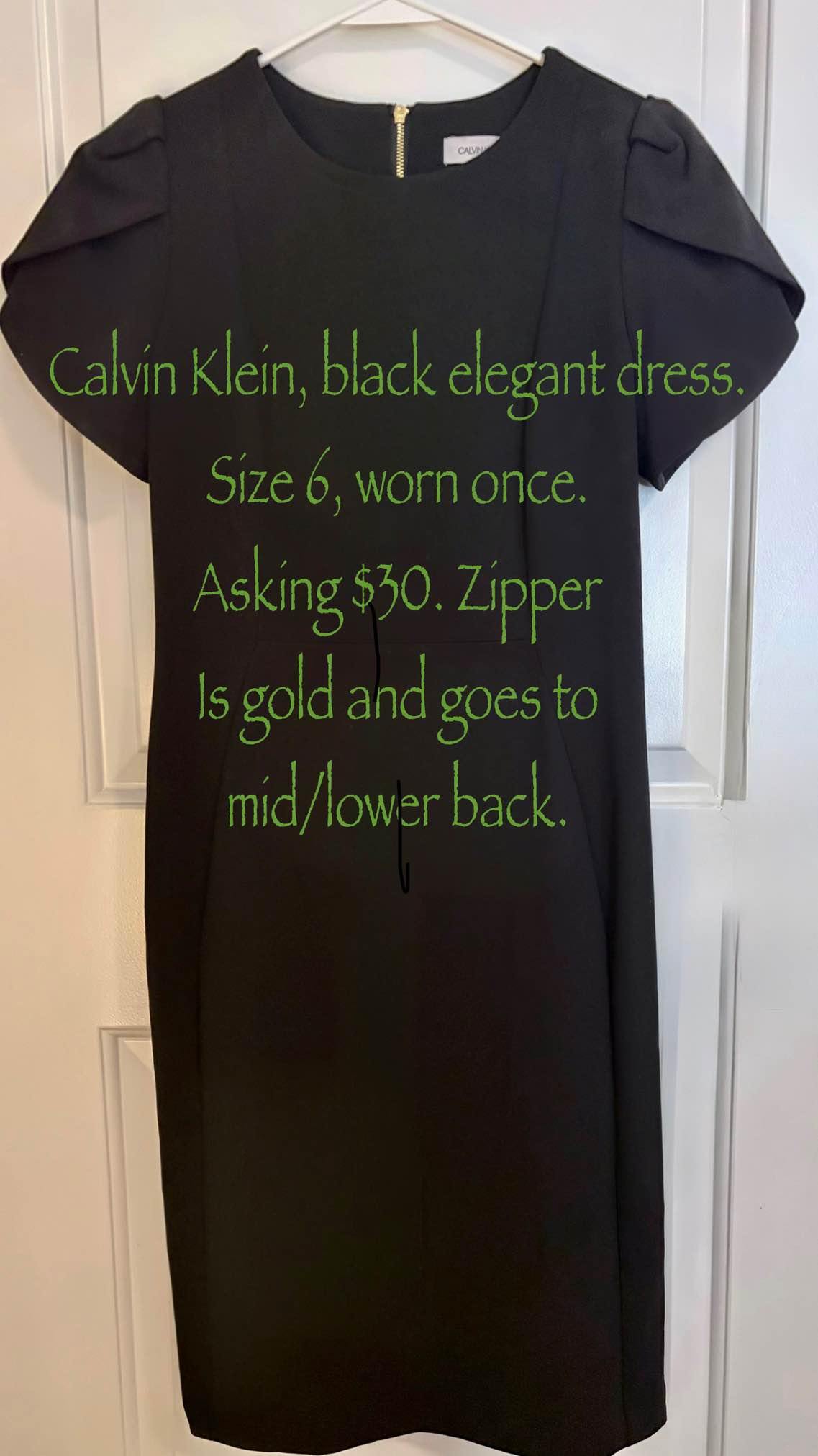calvin klein black dress with gold zipper in back elegant dress. Size 6, worn once. It has a beautiful running from top to the mid/lower Klein sleeveless dress