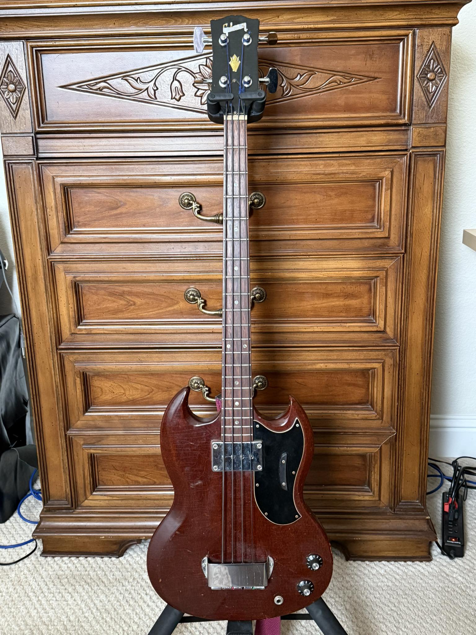 How to modify an Epiphone EB0 bass guitar to improve its sound?