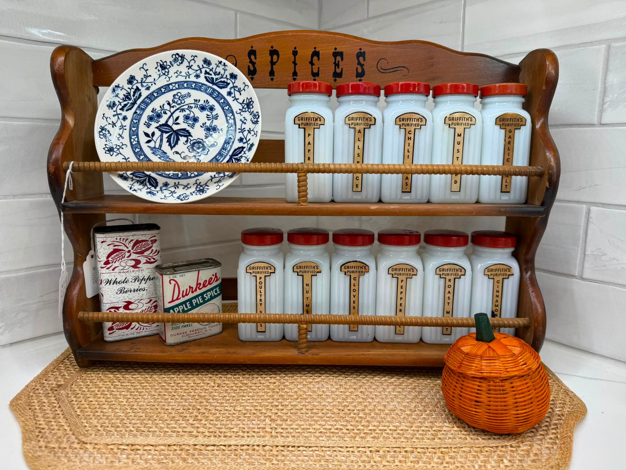 Vintage Griffith milk glass spice jars with wooden rack