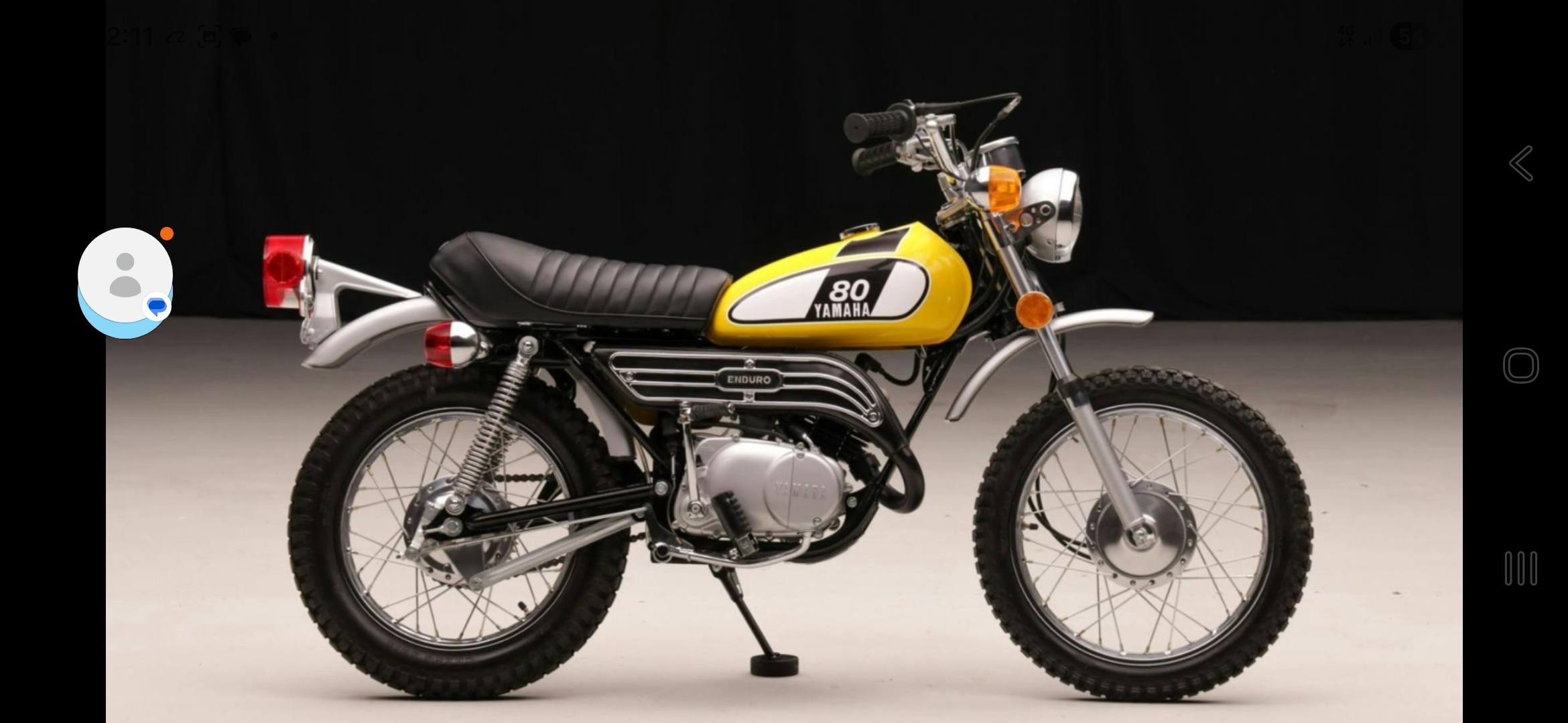 What are the stickers on this vintage Yamaha DG motorcycle?