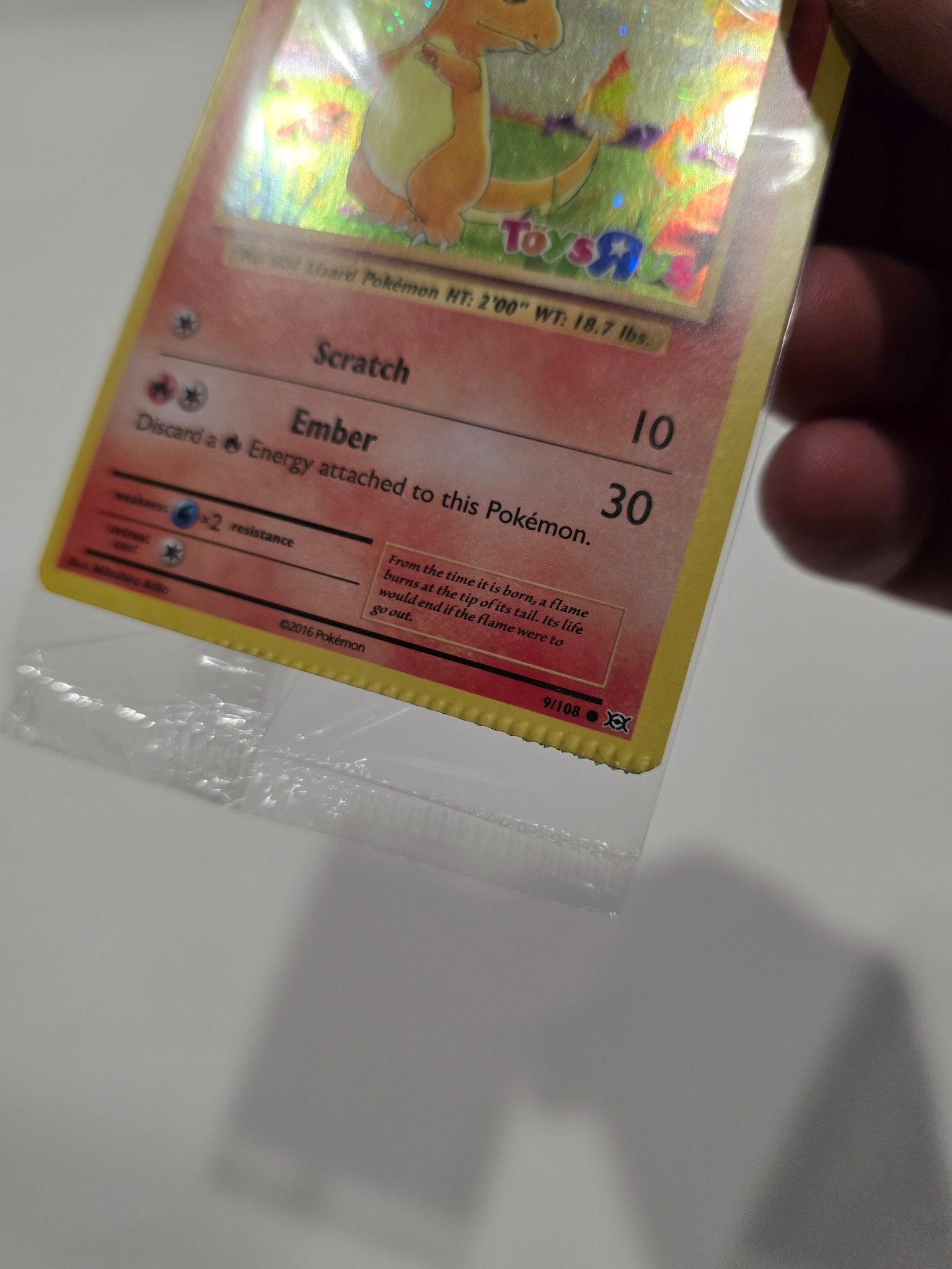 Why would a Pokemon card come back with a grade of 4 due to a 