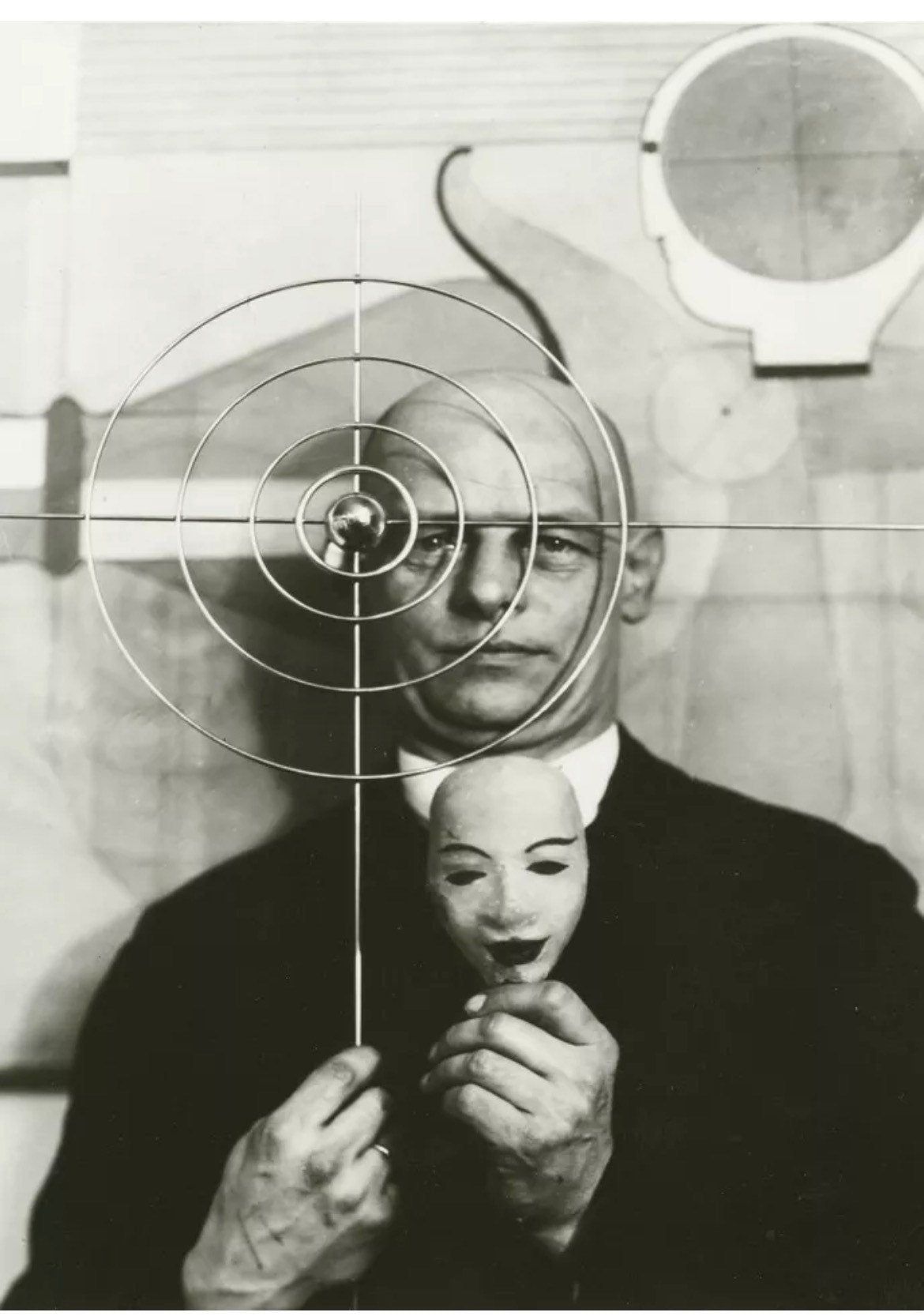 Oskar Schlemmer with mask and metal object, 1931