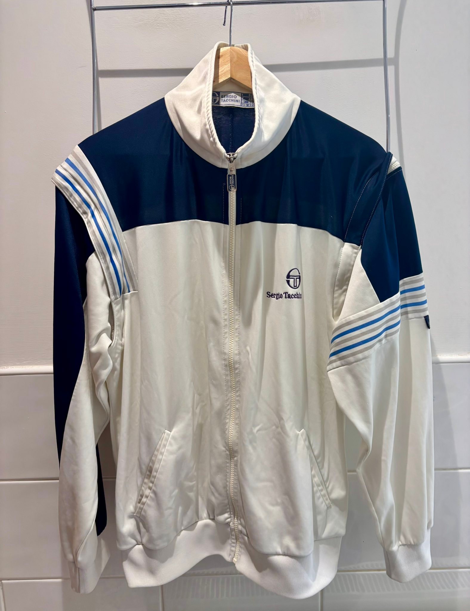 What's the value of this 80's Sergio Tacchini zip-off sleeve jacket?